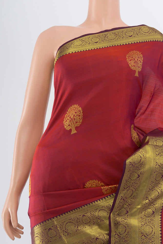 Border image of Maroon Kanchipuram Silk Saree with Plain Body and Silk Border. 
