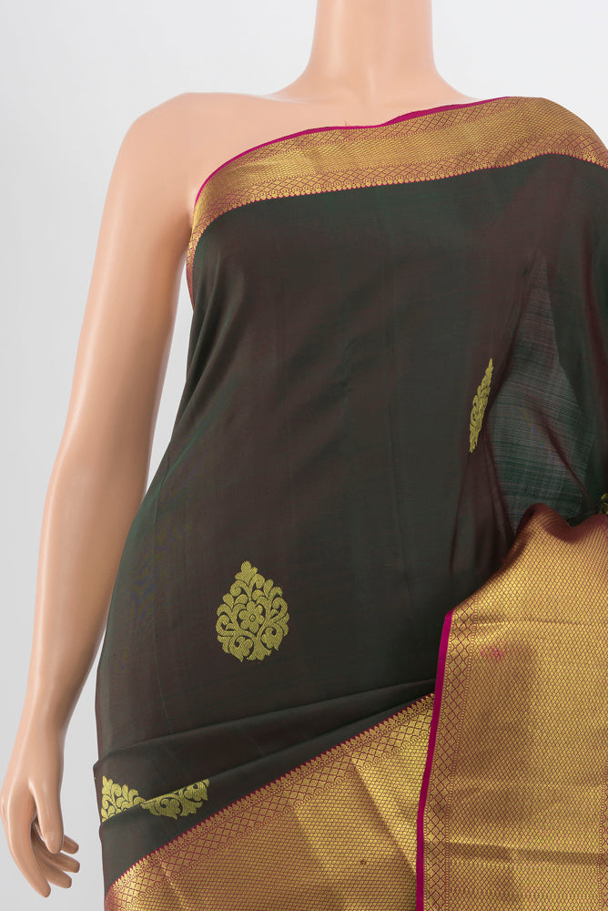 Border image of Pure Silk Pure Zari Mint Green Kanchipuram Saree with Zari Butta on the body and Silk Border. 