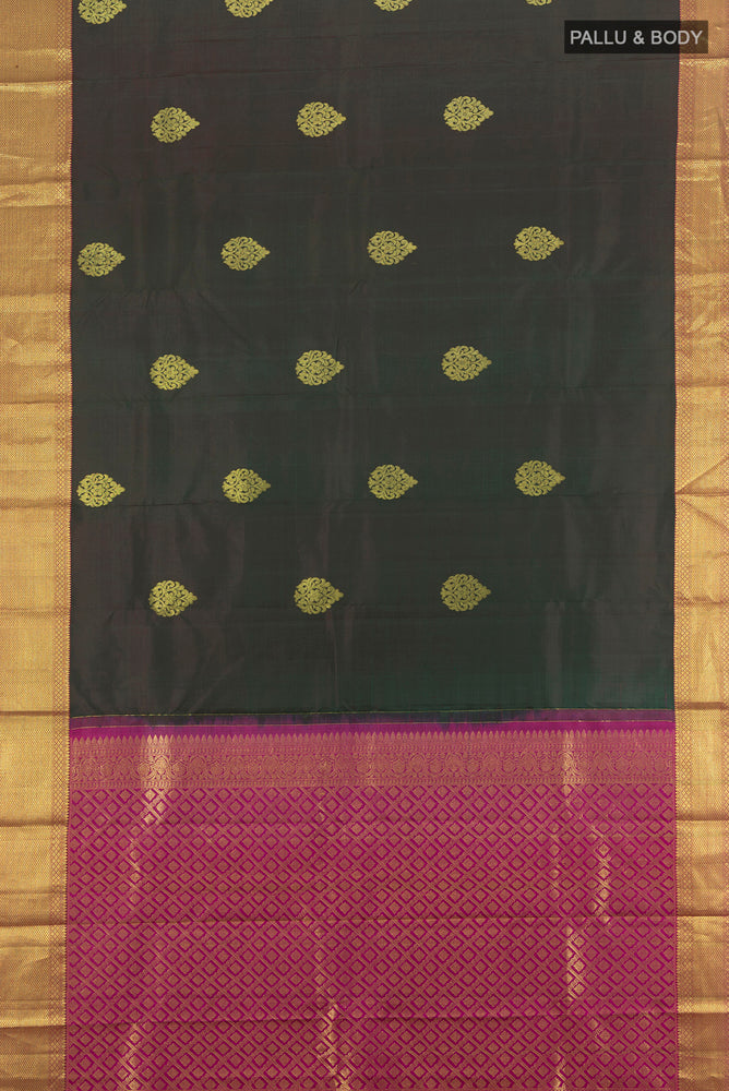 Flat view of Pure Silk Pure Zari Mint Green Kanchipuram Saree with Zari Butta on the body and Silk Border. 