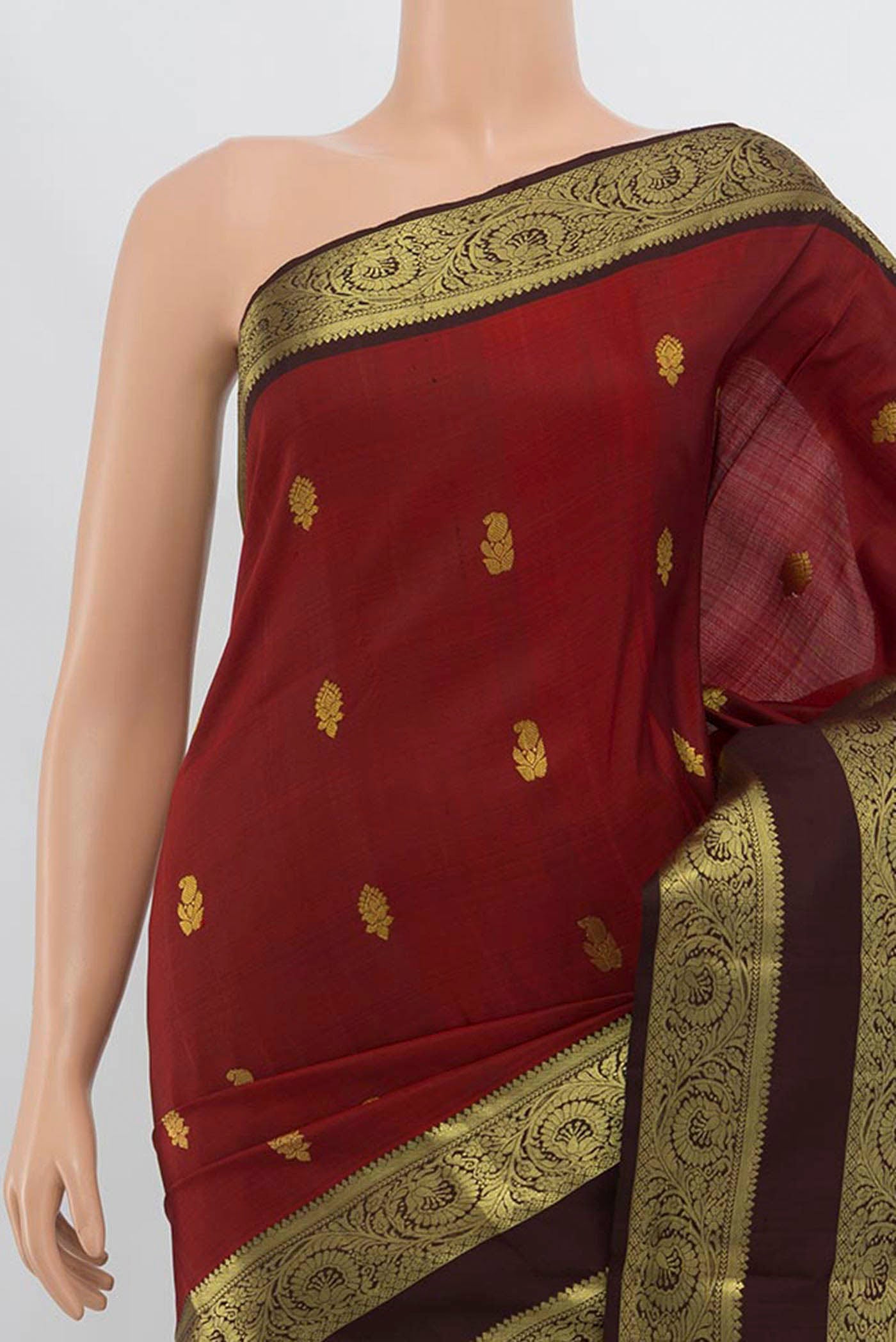 Border image of Maroon Kanchipuram Silk Saree with Zari Butta on the body and Silk Border. 