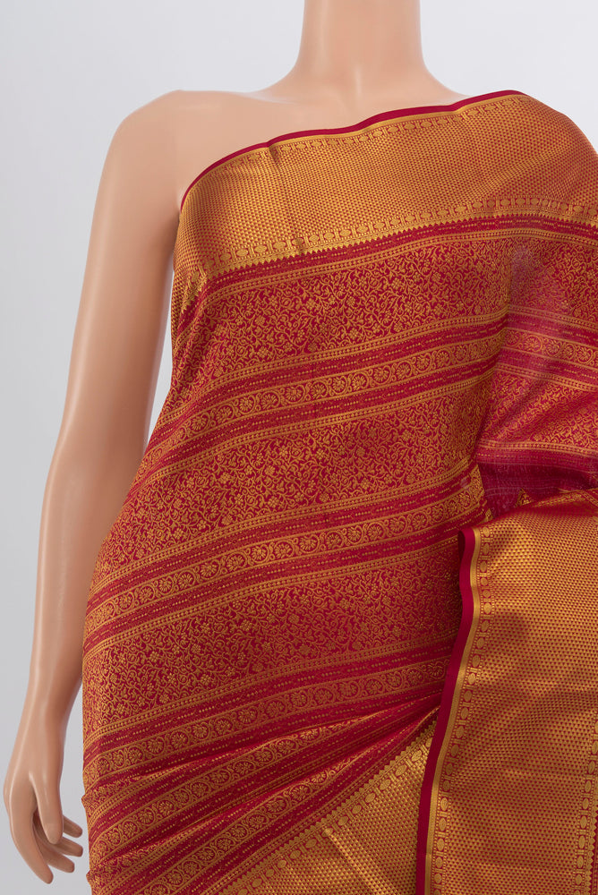 Border image of Maroon Kanjivaram Silk Saree with Zari Butta on the body and Silk Border. 