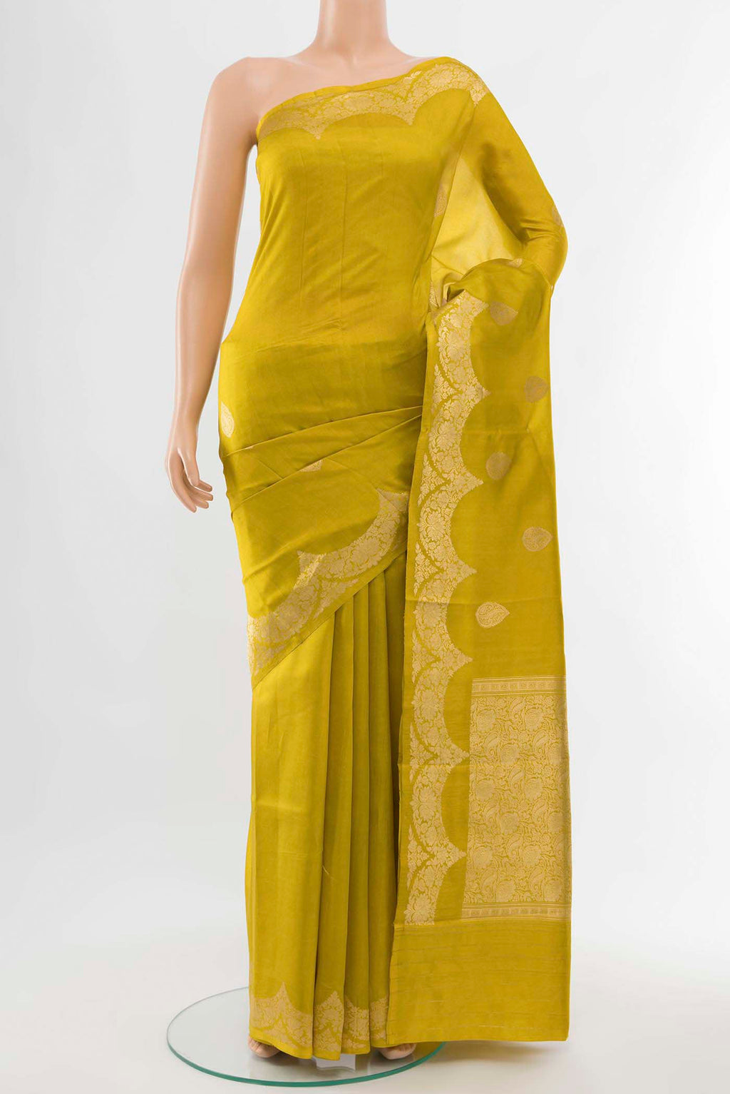 Mehandi Green Banarasi Raw Silk Saree with Zari Butta on the body and Silk Border displayed on a mannequin