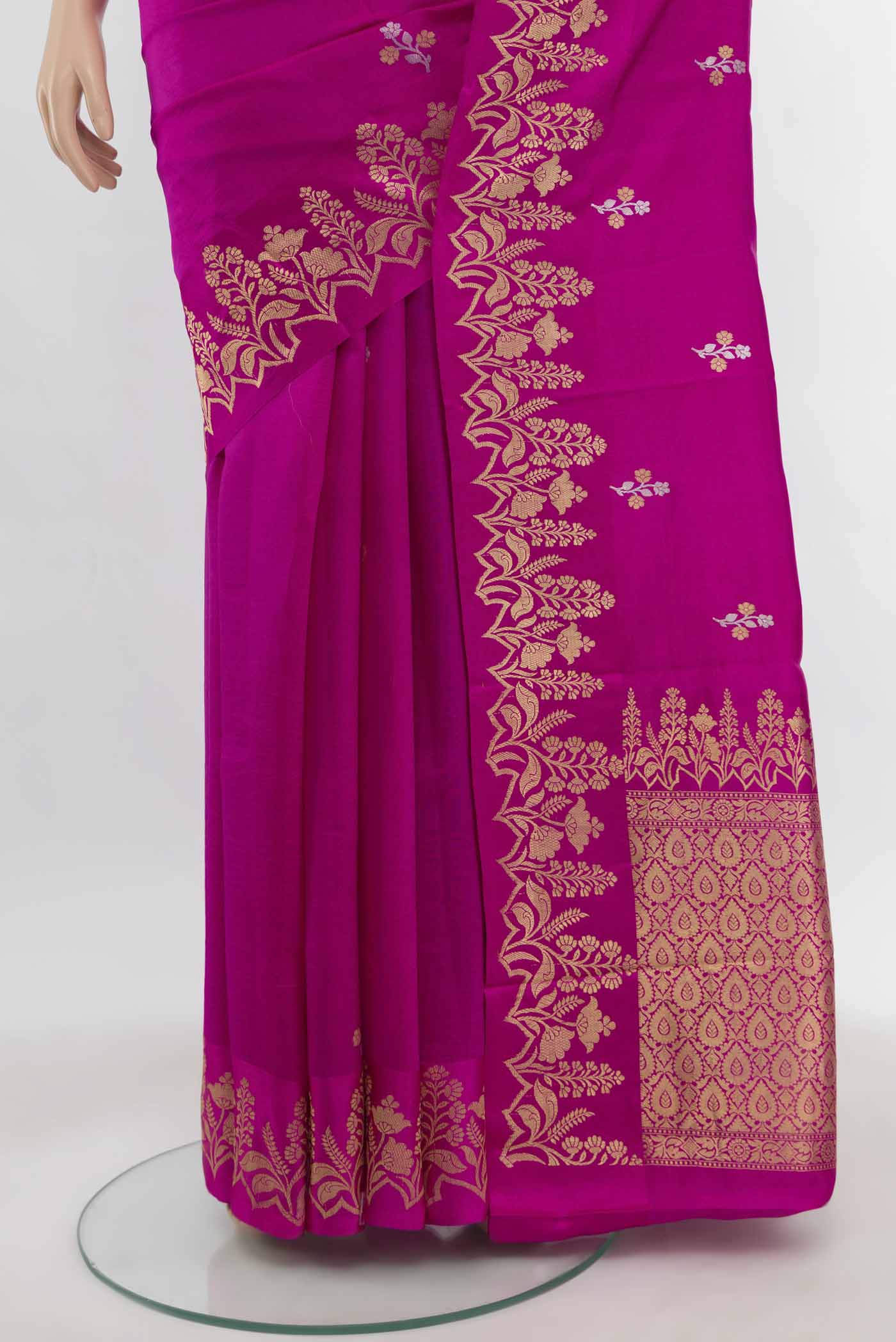 Pleats and pallu of Magenta Banarasi Katan Silk Saree with Zari Butta on the body and Zari Border. 