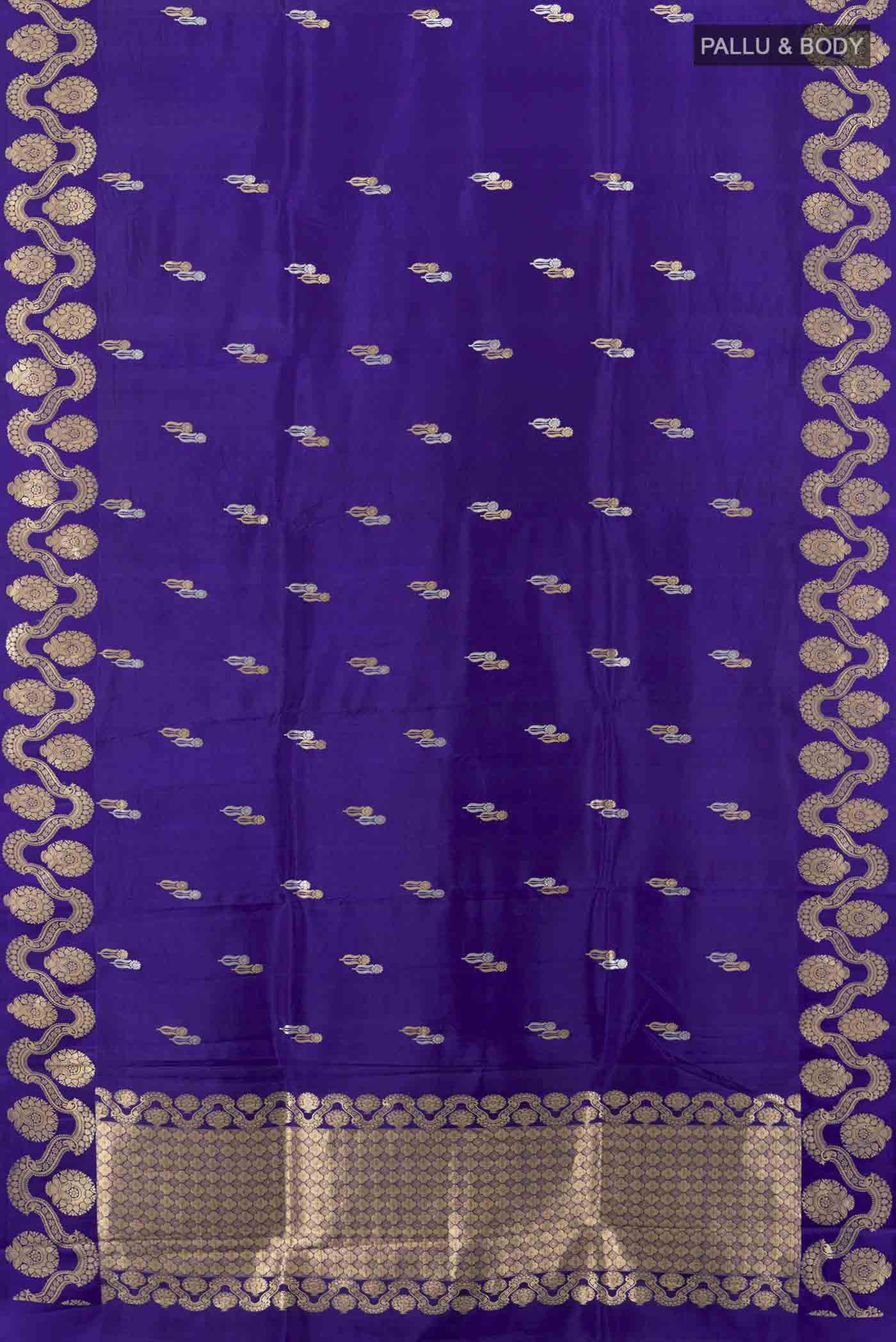 Flat view of Violet Banarasi Katan Silk Saree with Zari Butta on the body and Silk Border. 