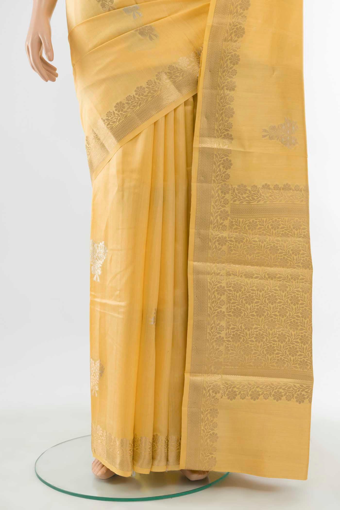 Pleats and pallu of Yellow Banarasi Raw Silk Saree with Zari Butta on the body and Silk Border