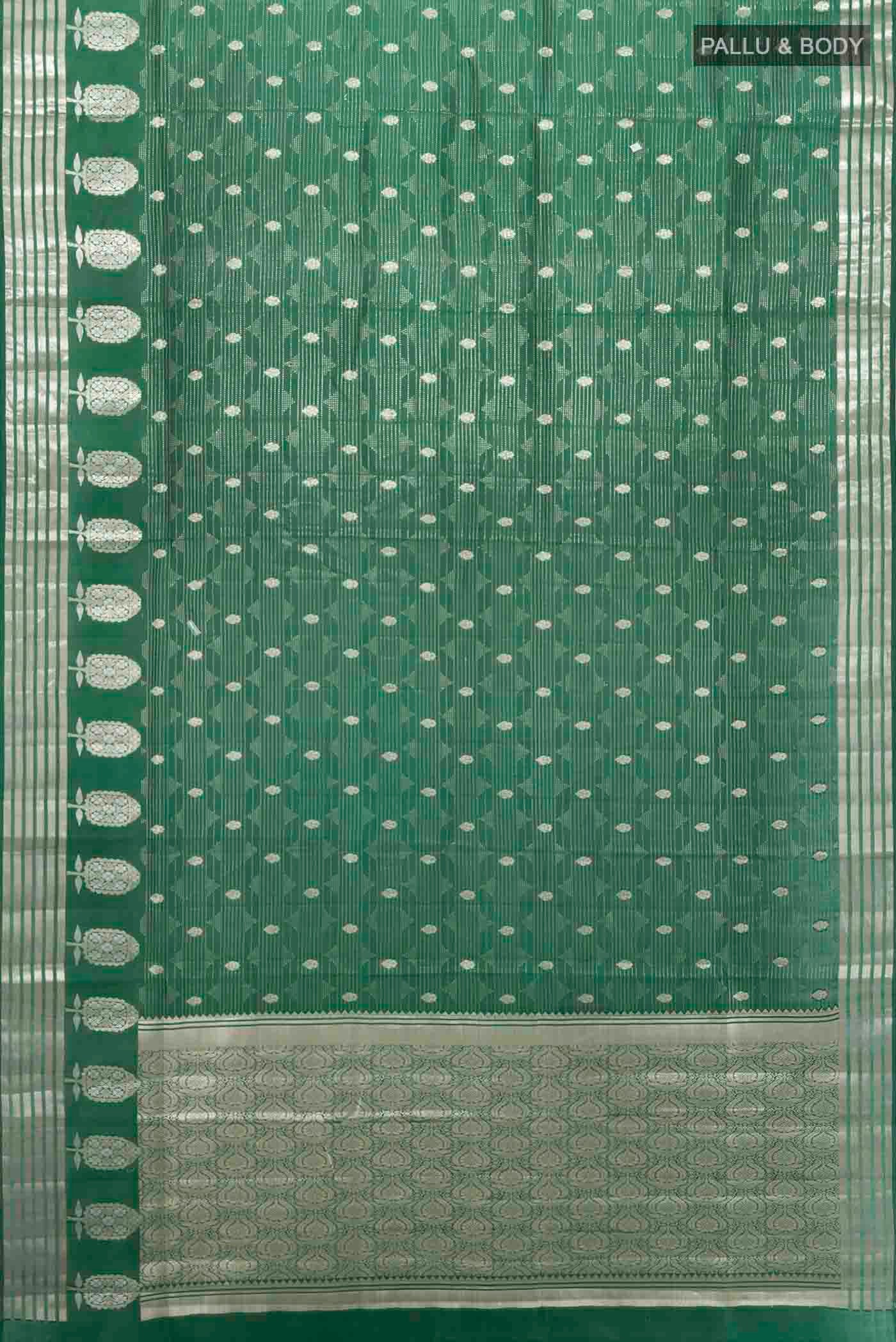 Flat view of Bottle Green Banarasi Raw Silk Saree with Zari Butta on the body and Silk Border