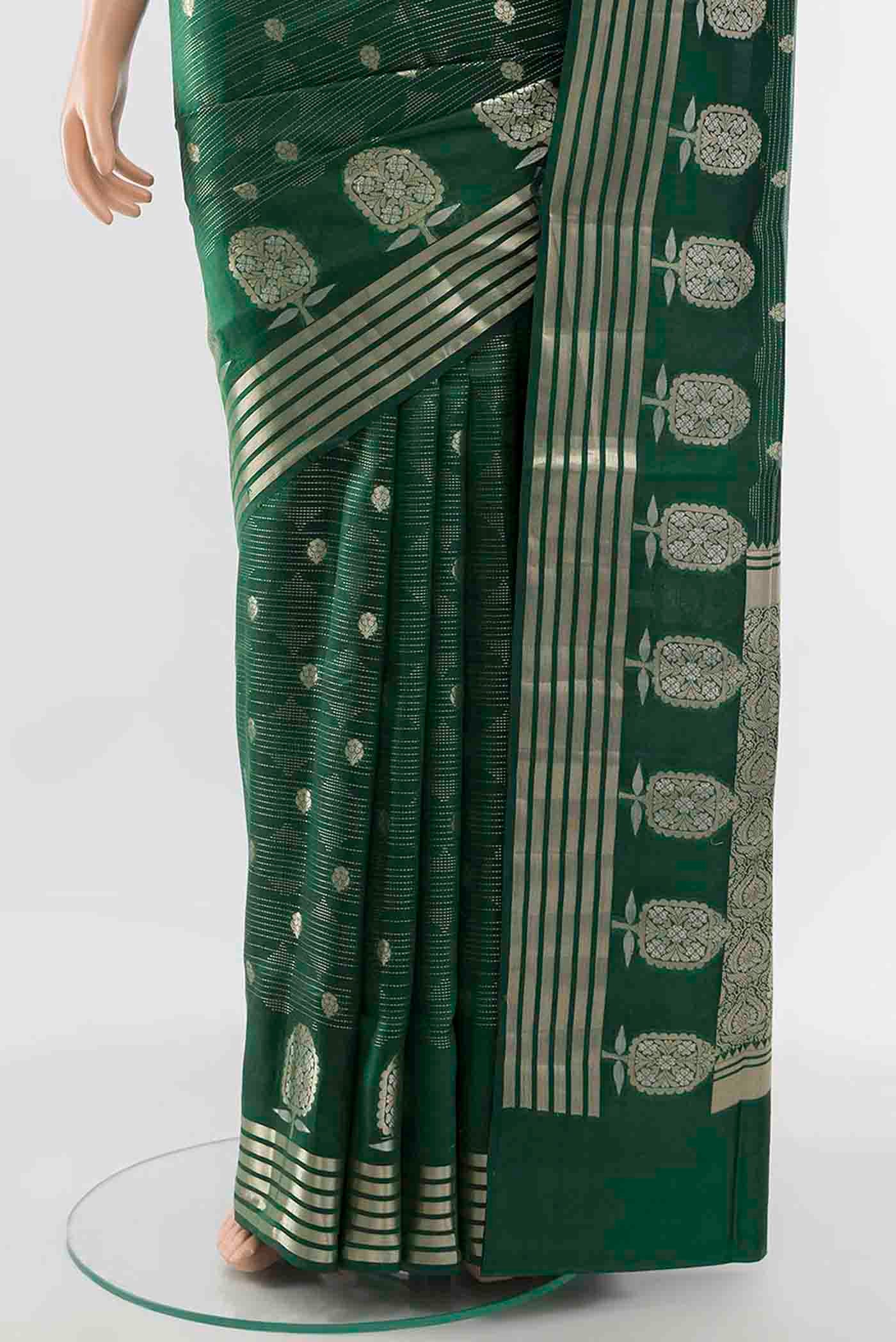 Pleats and pallu of Bottle Green Banarasi Raw Silk Saree with Zari Butta on the body and Silk Border