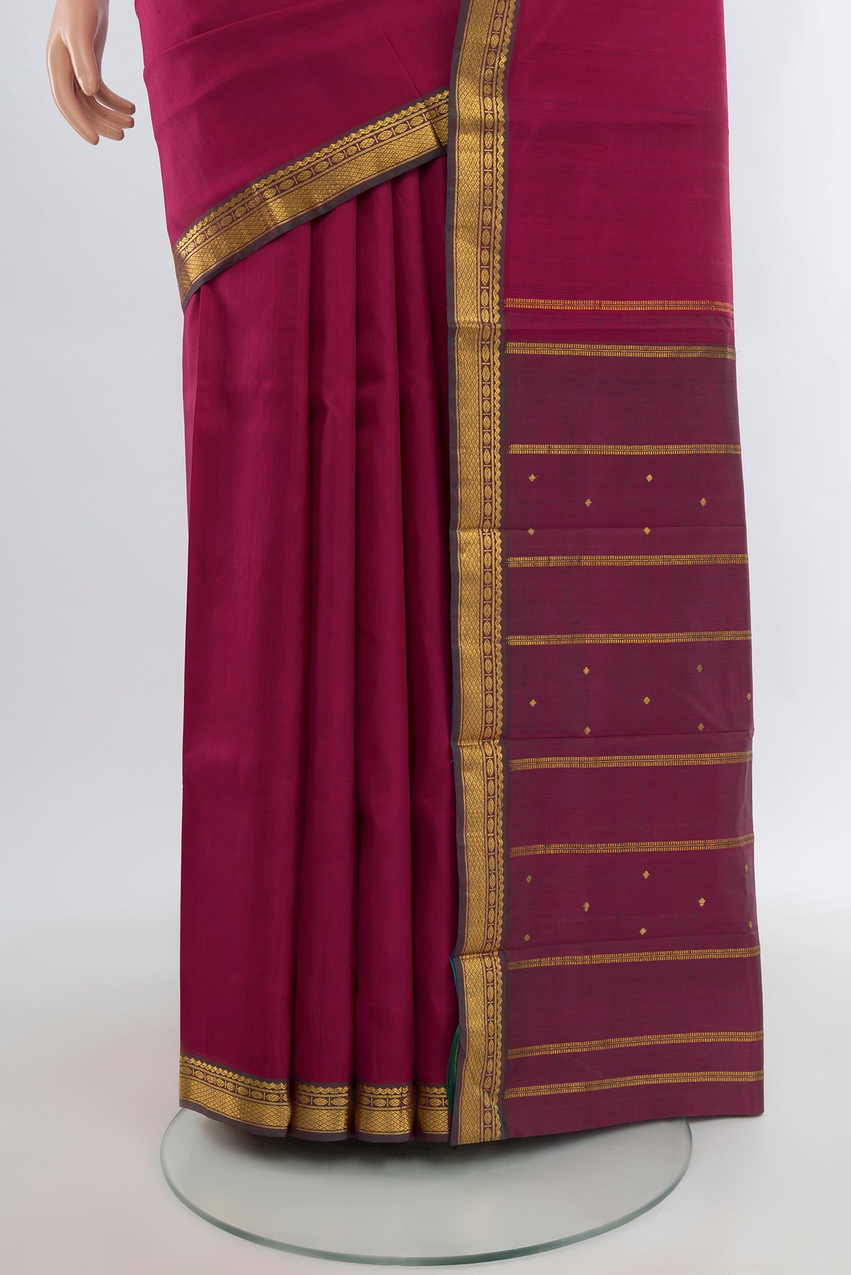 Pleats and pallu of Dark Pink Kanjivaram Silk Saree with Plain Body and Zari Border. 