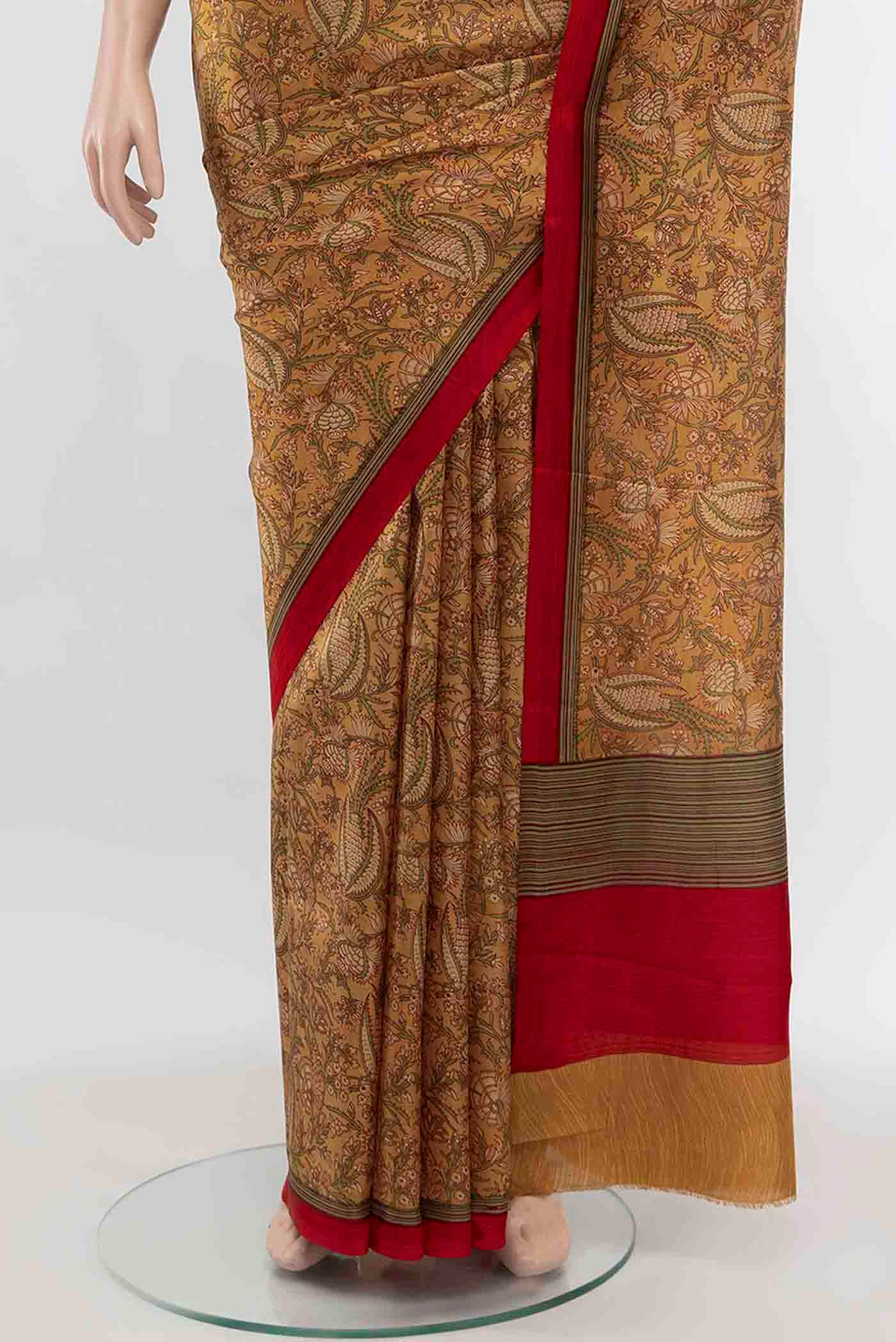Pleats and pallu of Beige Printed Silk Saree with Floral Print on the body and Fancy Border