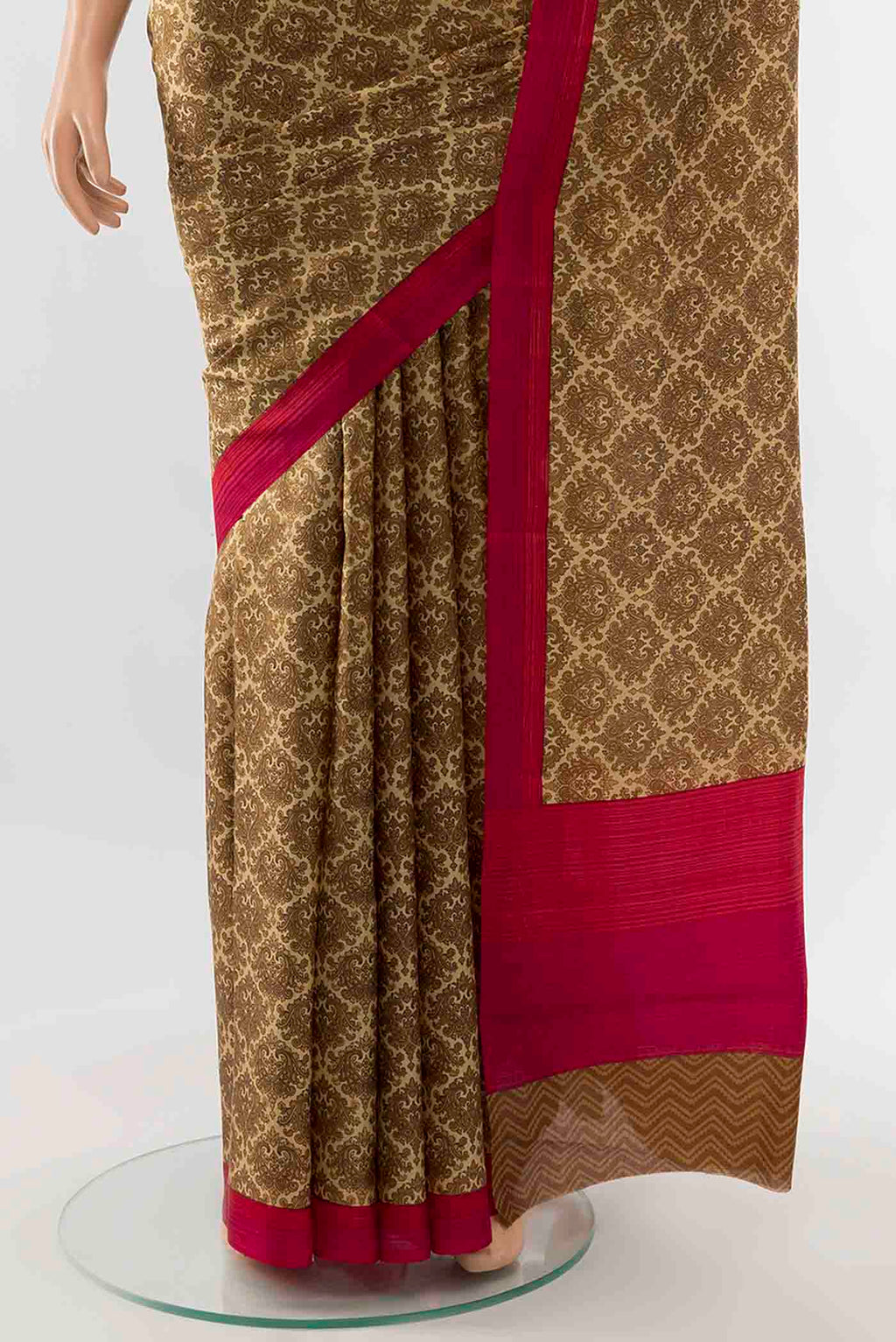 Pleats and pallu of Bronze Printed Silk Saree with Floral Print on the body and Fancy Border