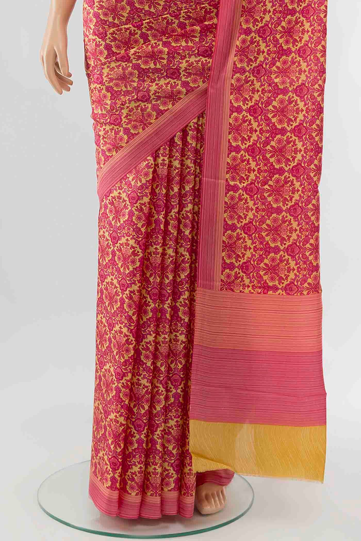 Pleats and pallu of Dark Pink Printed Silk Saree with Floral Print on the body and Fancy Border