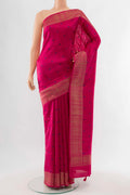 Dark Pink Tussar Silk Saree with Zari Butta on the body and Silk Border displayed on a mannequin