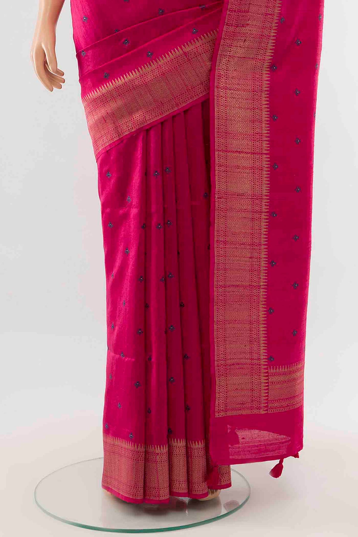 Pleats and pallu of Dark Pink Tussar Silk Saree with Zari Butta on the body and Silk Border