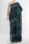 Navy Blue Tussar Silk Saree with Floral Print on the body and Silk Border displayed on a mannequin