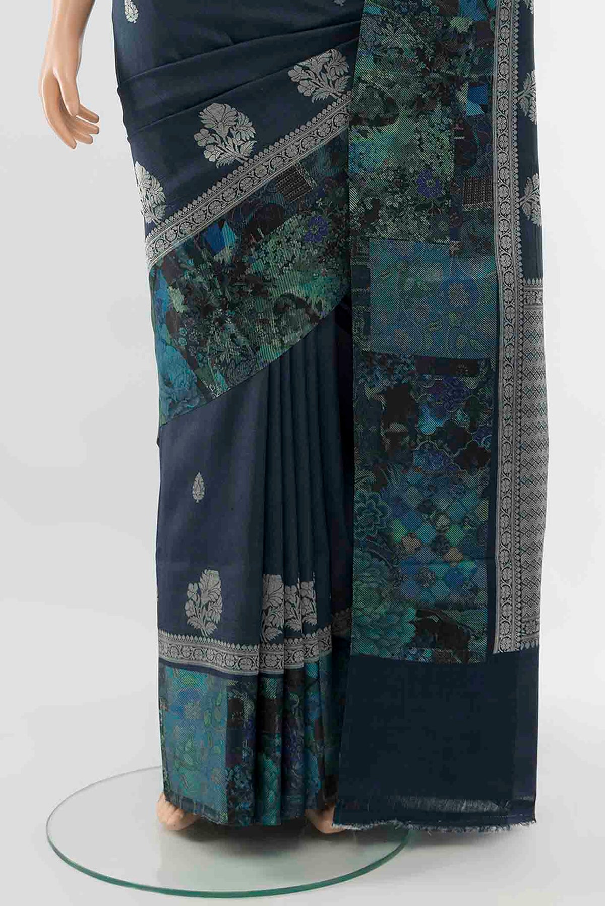 Pleats and pallu of Navy Blue Tussar Silk Saree with Floral Print on the body and Silk Border