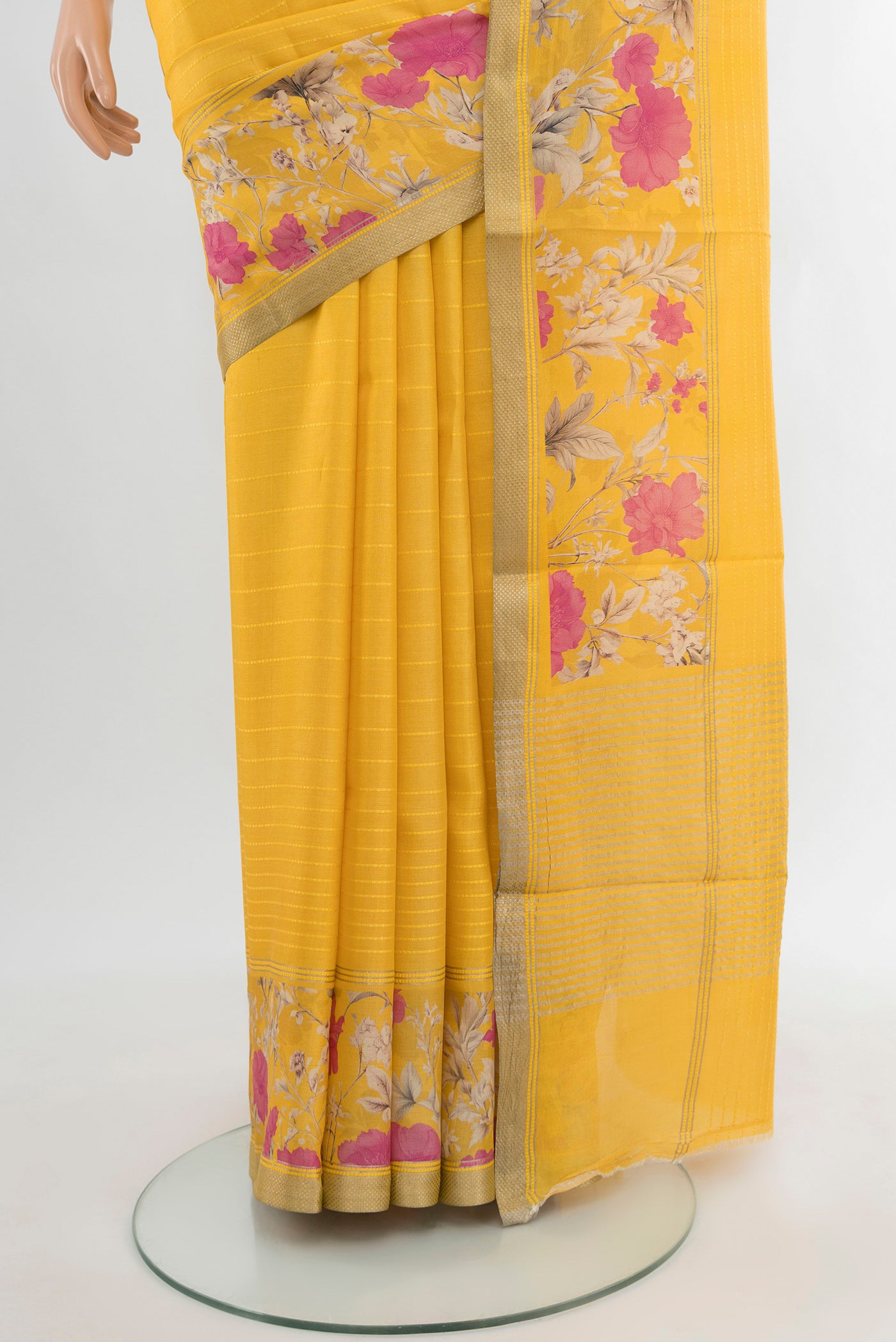 Pleats and pallu of Yellow Tussar Silk Saree with Stripes on the body and Zari Border. 