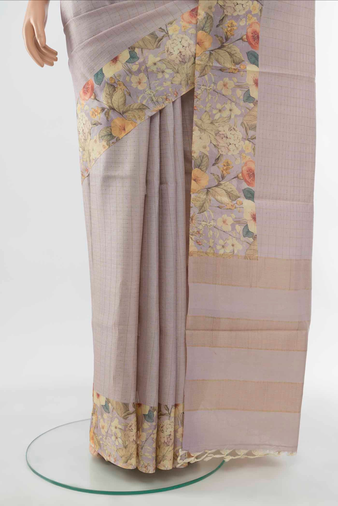 Pleats and pallu of Lavender Tussar Silk Saree with Floral Print on the body and Thread Border