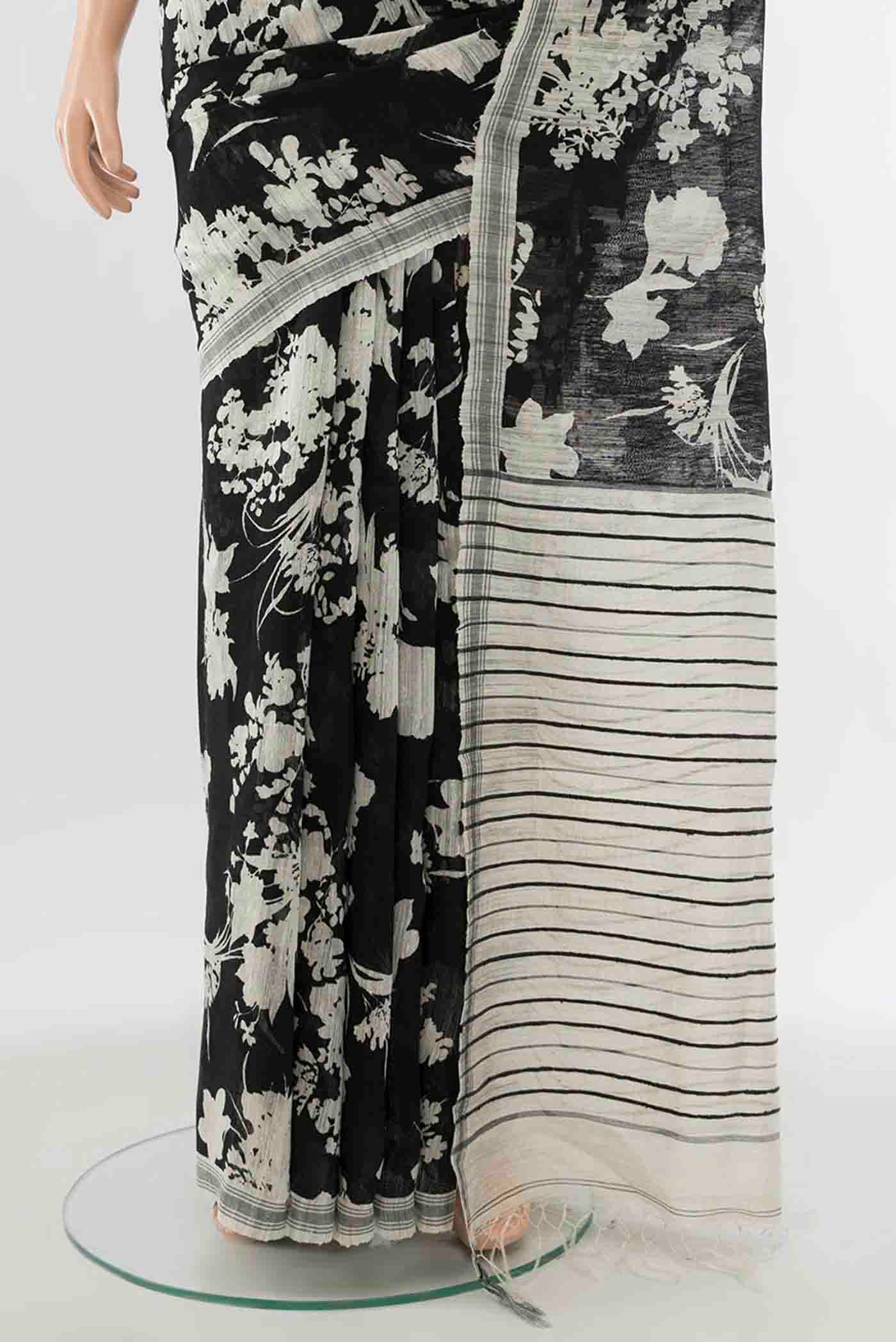 Pleats and pallu of Black Bhagalpuri Tussar Silk Saree with Floral Print on the body and Plain Border