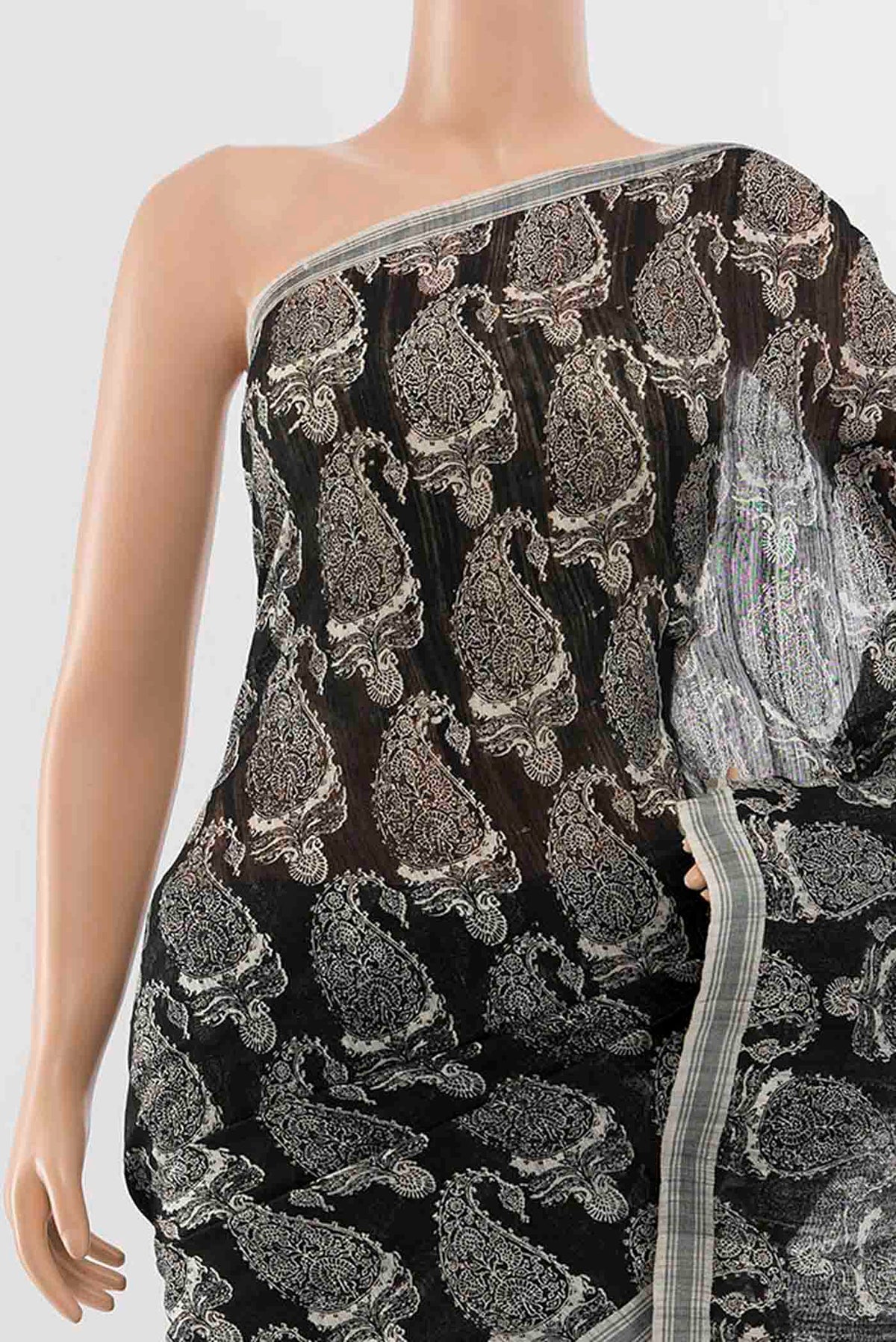 Border image of Black Tussar Silk Saree with Zari Butta on the body and Zari Border