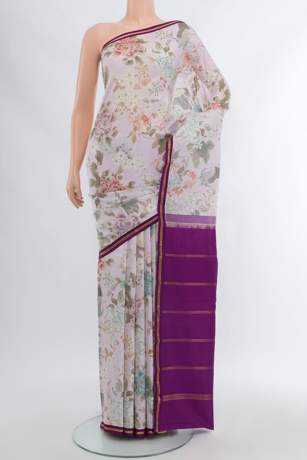 Multi Color Printed Silk Saree with Floral Print on the body and Silk Border.  displayed on a mannequin