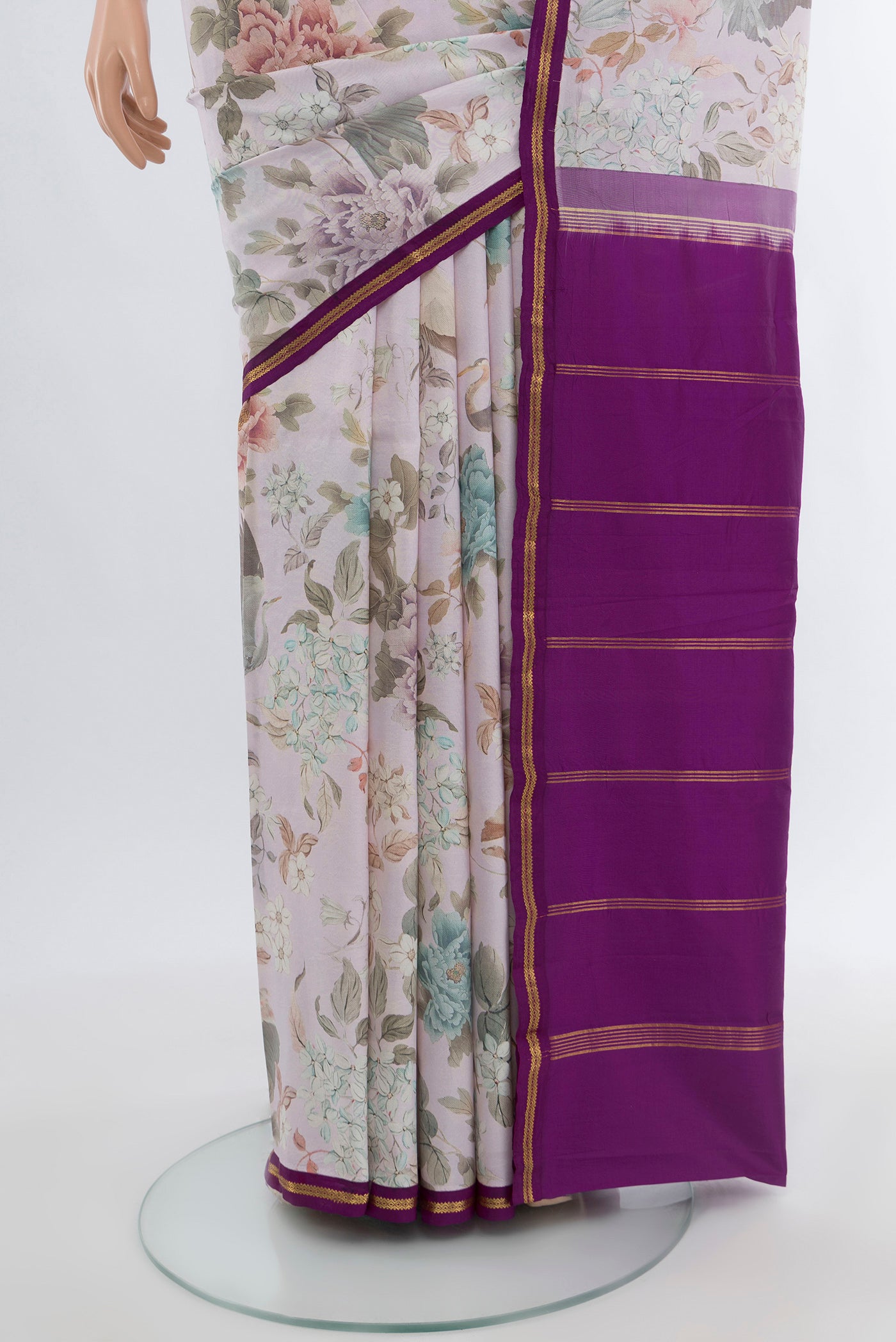 Pleats and pallu of Multi Color Printed Silk Saree with Floral Print on the body and Silk Border. 