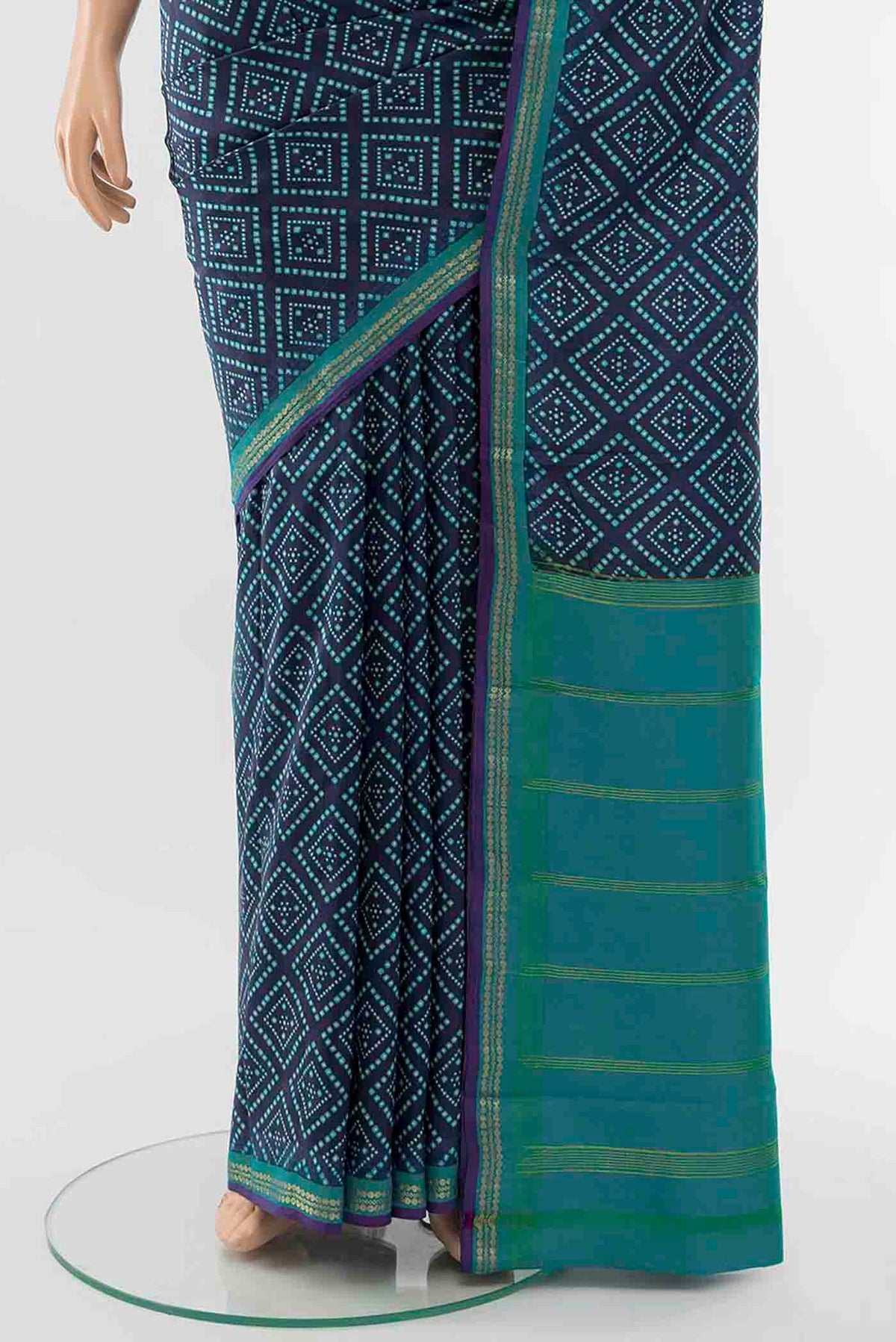 Pleats and pallu of Navy Blue Printed Silk Saree with Floral Print on the body and Fancy Border