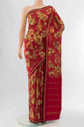 Maroon Printed Silk Saree with Floral Print on the body and Fancy Border displayed on a mannequin