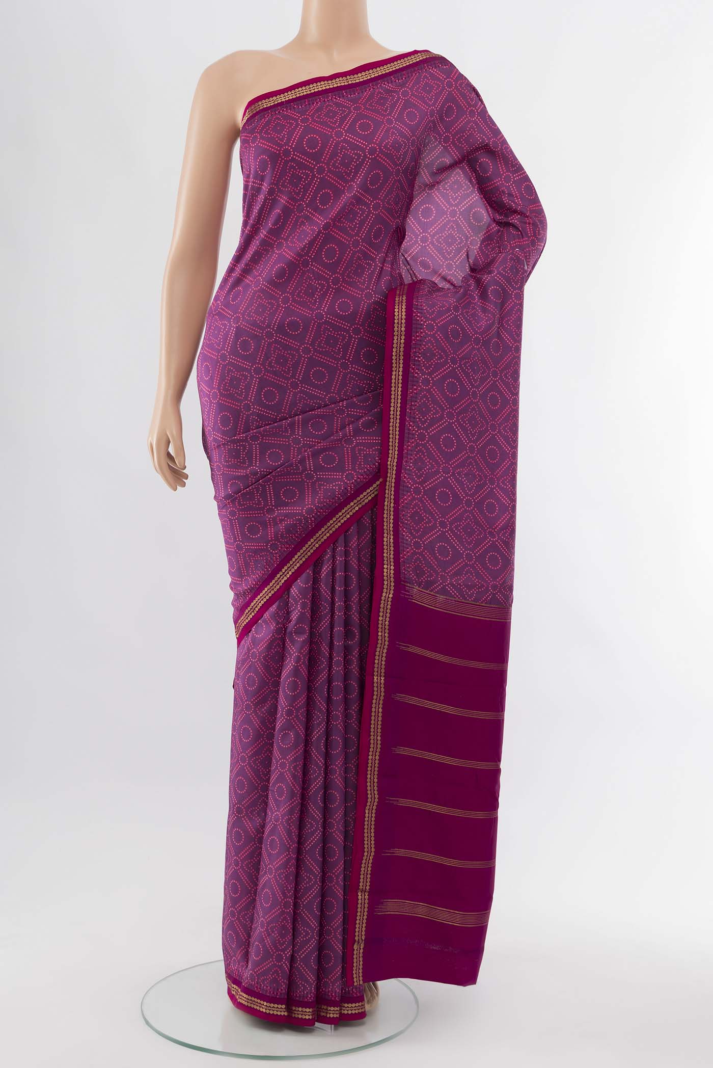 Purple Printed Silk Saree with Zari Butta on the body and Silk Border displayed on a mannequin