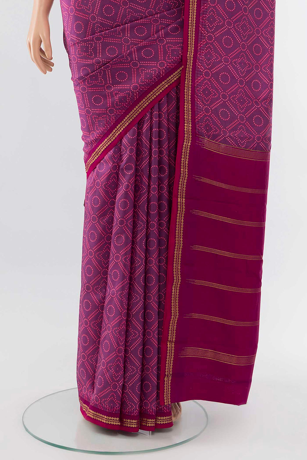 Pleats and pallu of Purple Printed Silk Saree with Zari Butta on the body and Silk Border