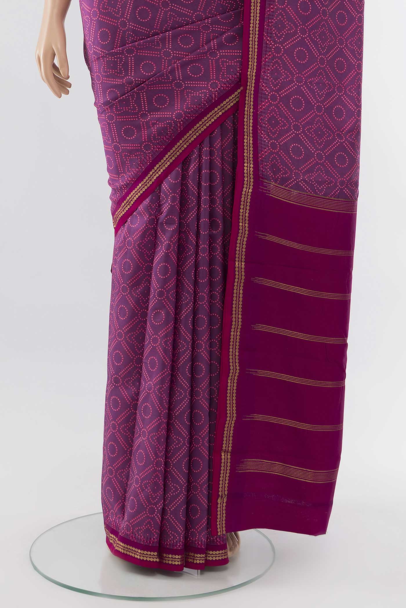 Pleats and pallu of Purple Printed Silk Saree with Zari Butta on the body and Silk Border