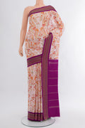Cream Printed Silk Saree with Floral Print on the body and Thread Border.  displayed on a mannequin