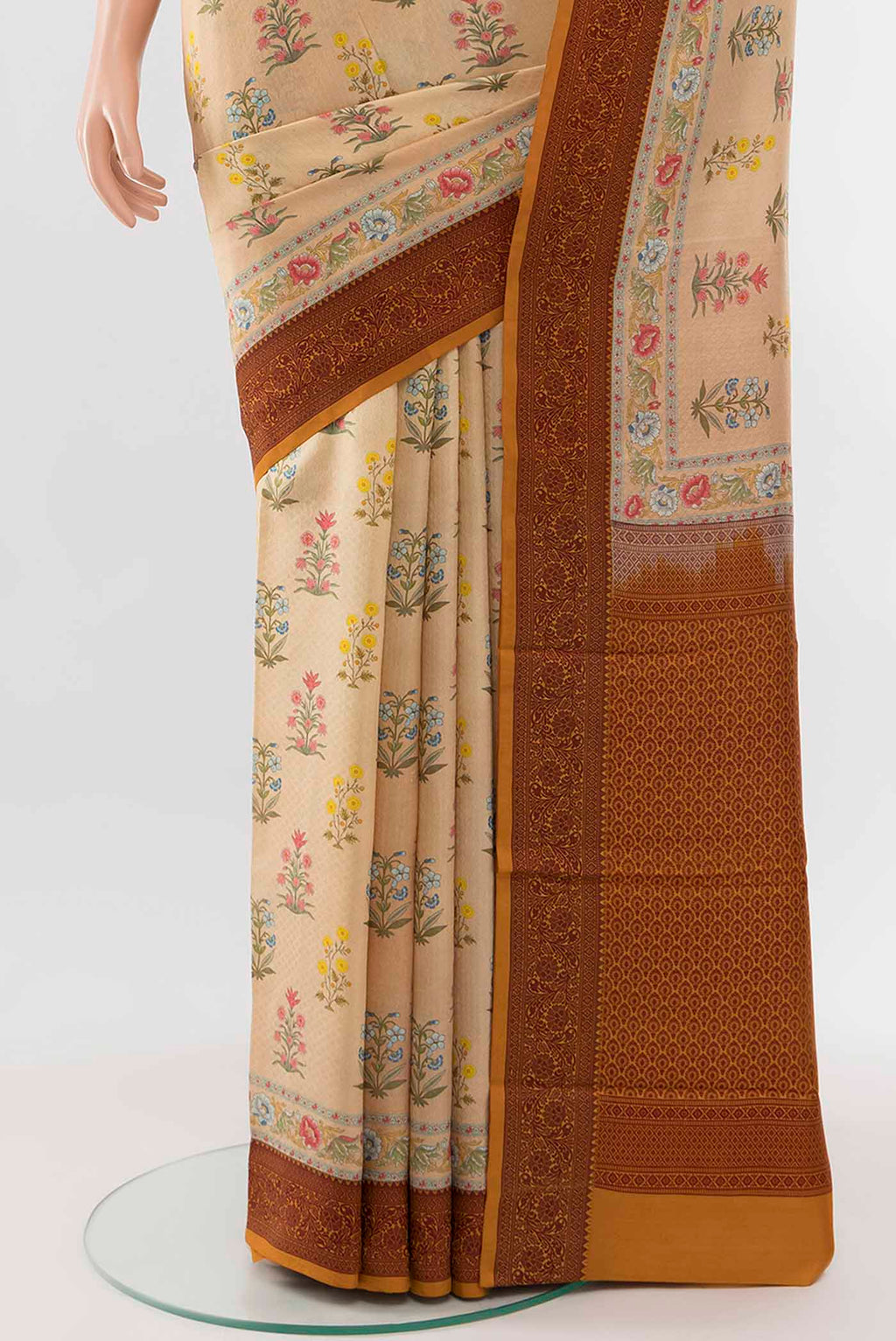 Pleats and pallu of Sandal Printed Silk Saree with Floral Print on the body and Thread Border