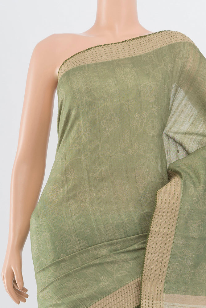 Border image of Pure Silk Pure Zari Pista Green Tussar Saree with Floral Print on the body and Silk Border. 