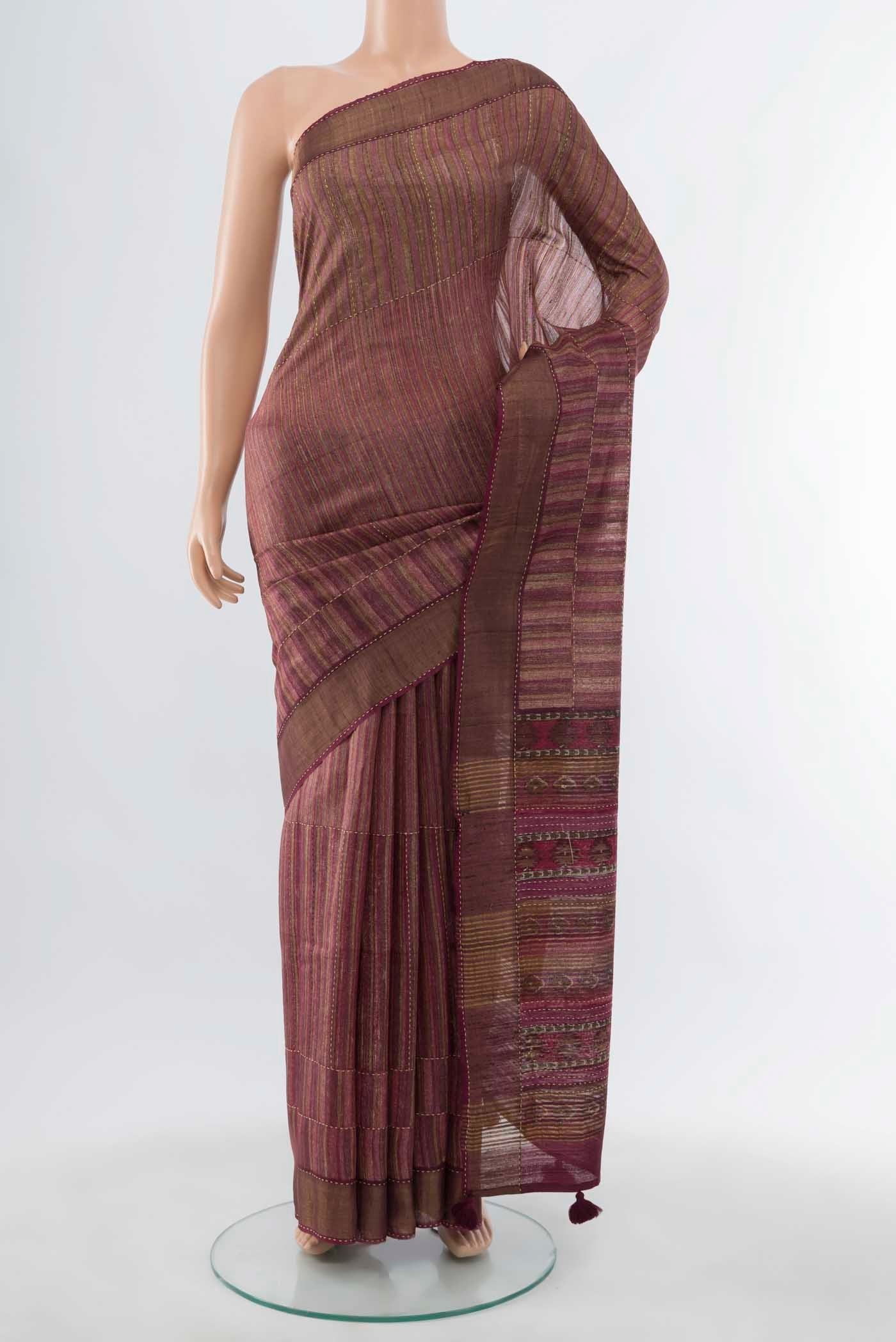 Imperial Pink Tussar Silk Saree with Embroidery on the body and Thread Border displayed on a mannequin