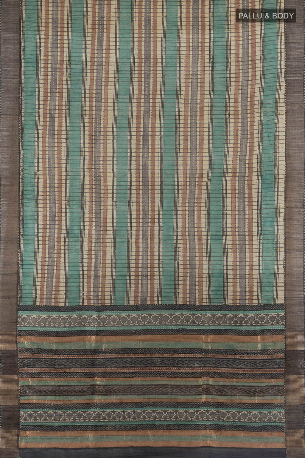 Flat view of Multi Color Tussar Saree with Printed design on the body and Zari Border. 