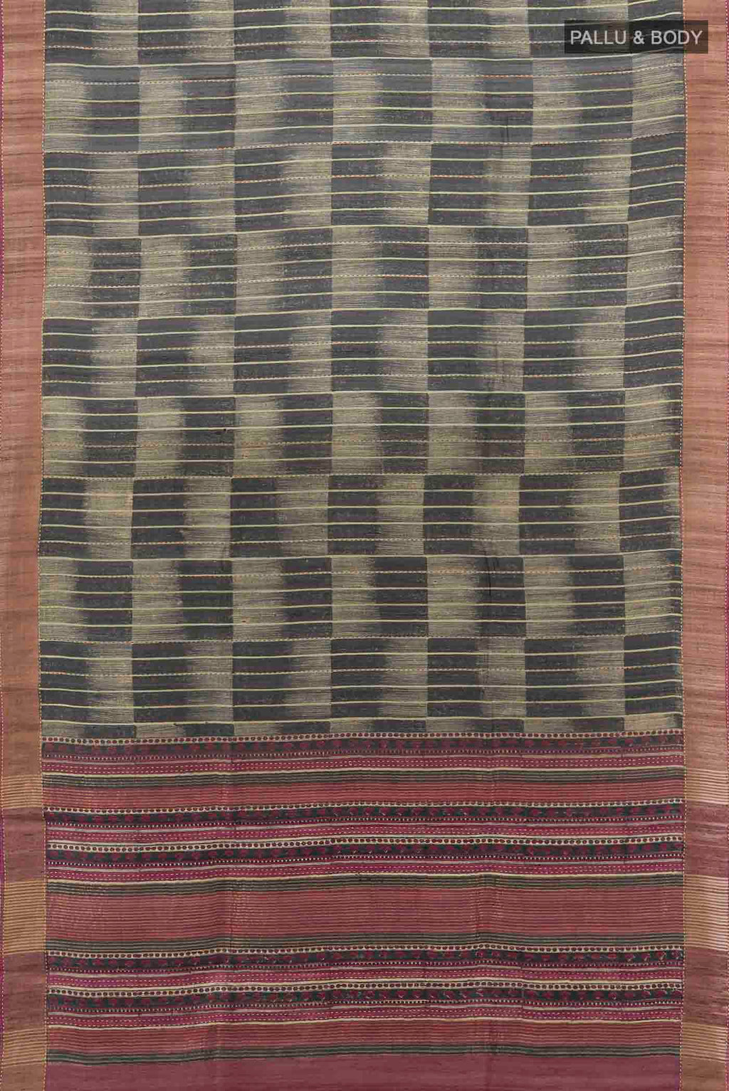 Flat view of Black Tussar Silk Saree with Zari Butta on the body and Silk Border