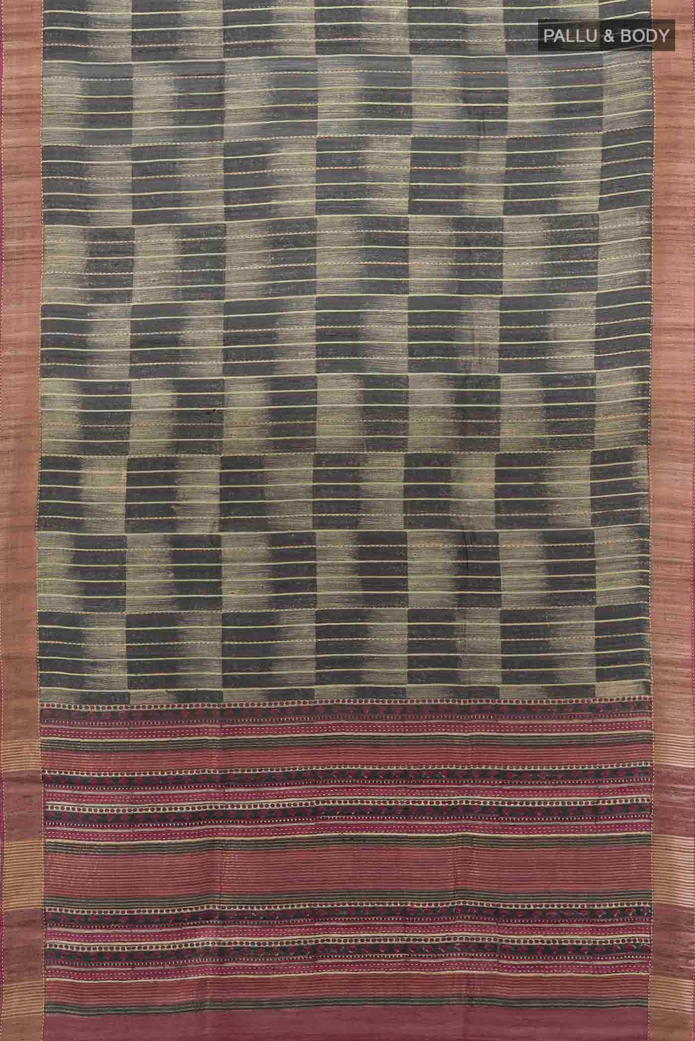 Flat view of Black Tussar Silk Saree with Zari Butta on the body and Silk Border