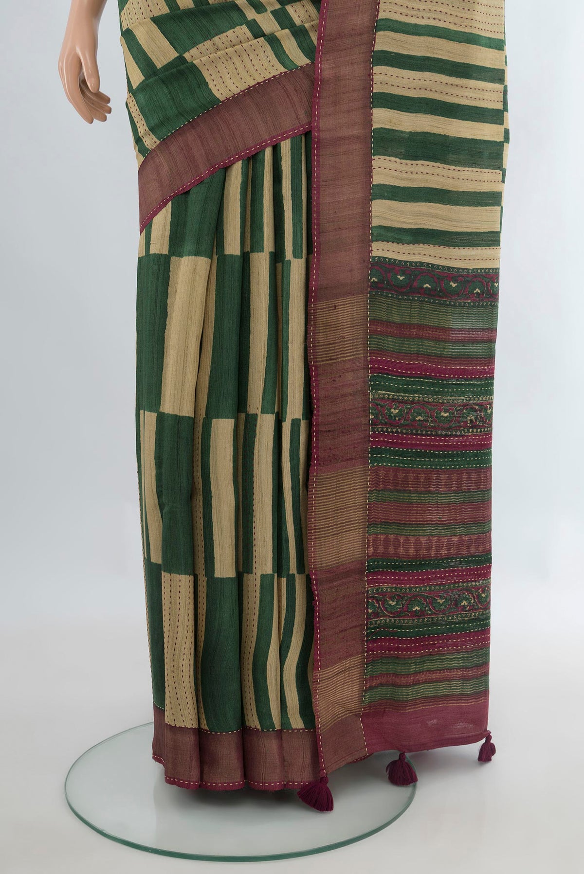 Pleats and pallu of Multi Color Tussar Saree with Floral Print on the body and Zari Border. 