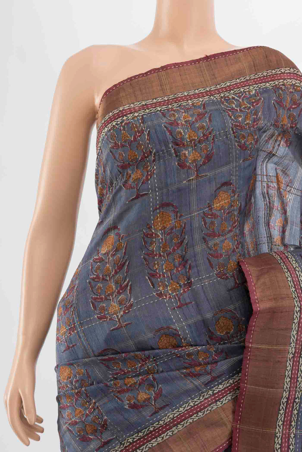 Border image of Grey Tussar Silk Saree with Zari Butta on the body and Silk Border