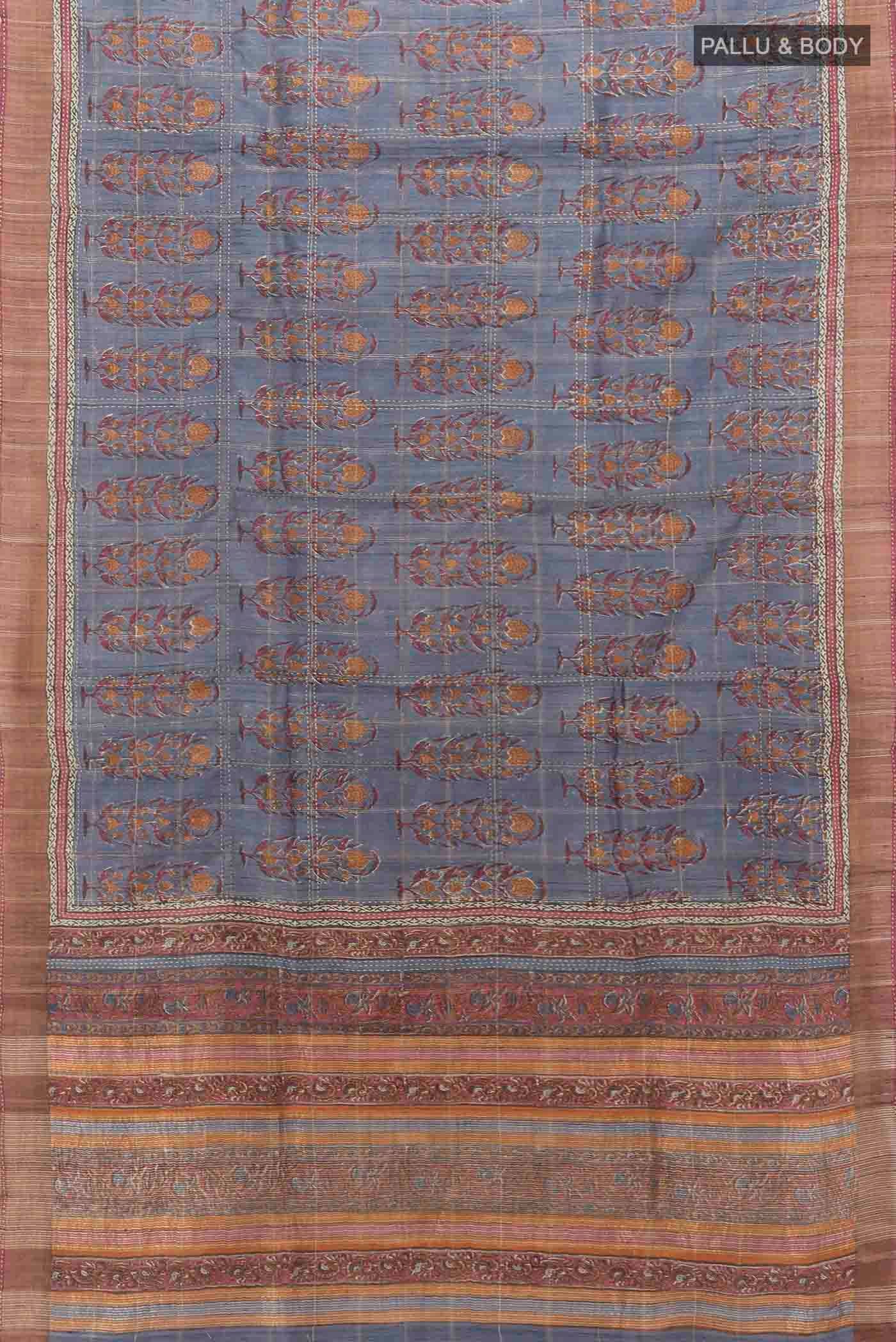 Flat view of Grey Tussar Silk Saree with Zari Butta on the body and Silk Border