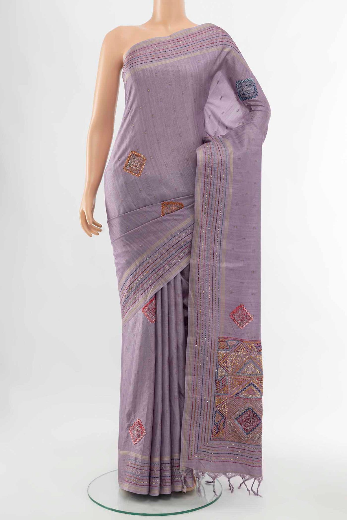 Lavender Blended Tussar Silk Saree with Embroidery on the body and Embroidery Border displayed on a mannequin
