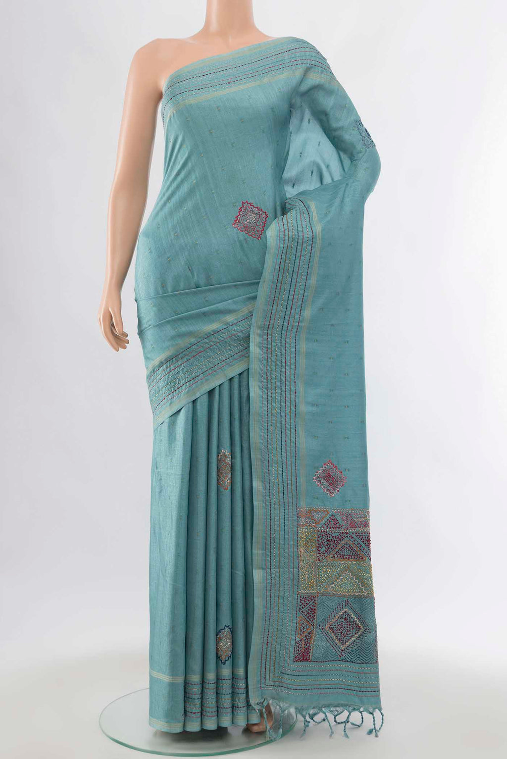 Light Blue Blended Tussar Silk Saree with Embroidery on the body and Embroidery Border displayed on a mannequin