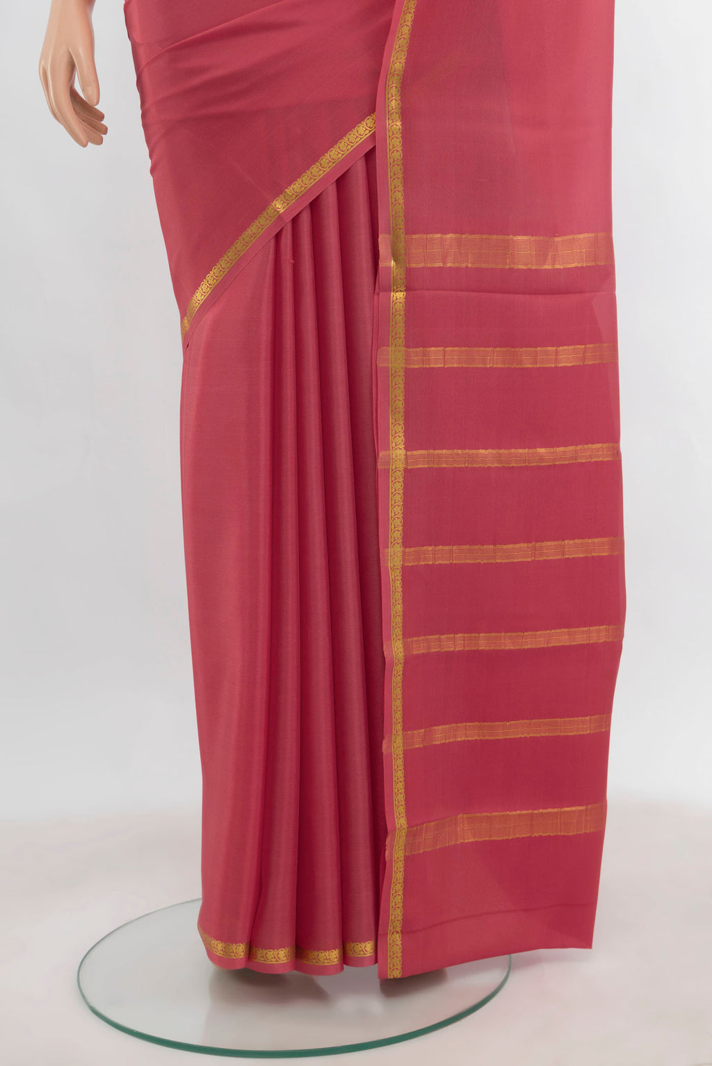 Pleats and pallu of Imperial Pink Mysore Crepe Saree with Zari Butta on the body and Zari Border. 
