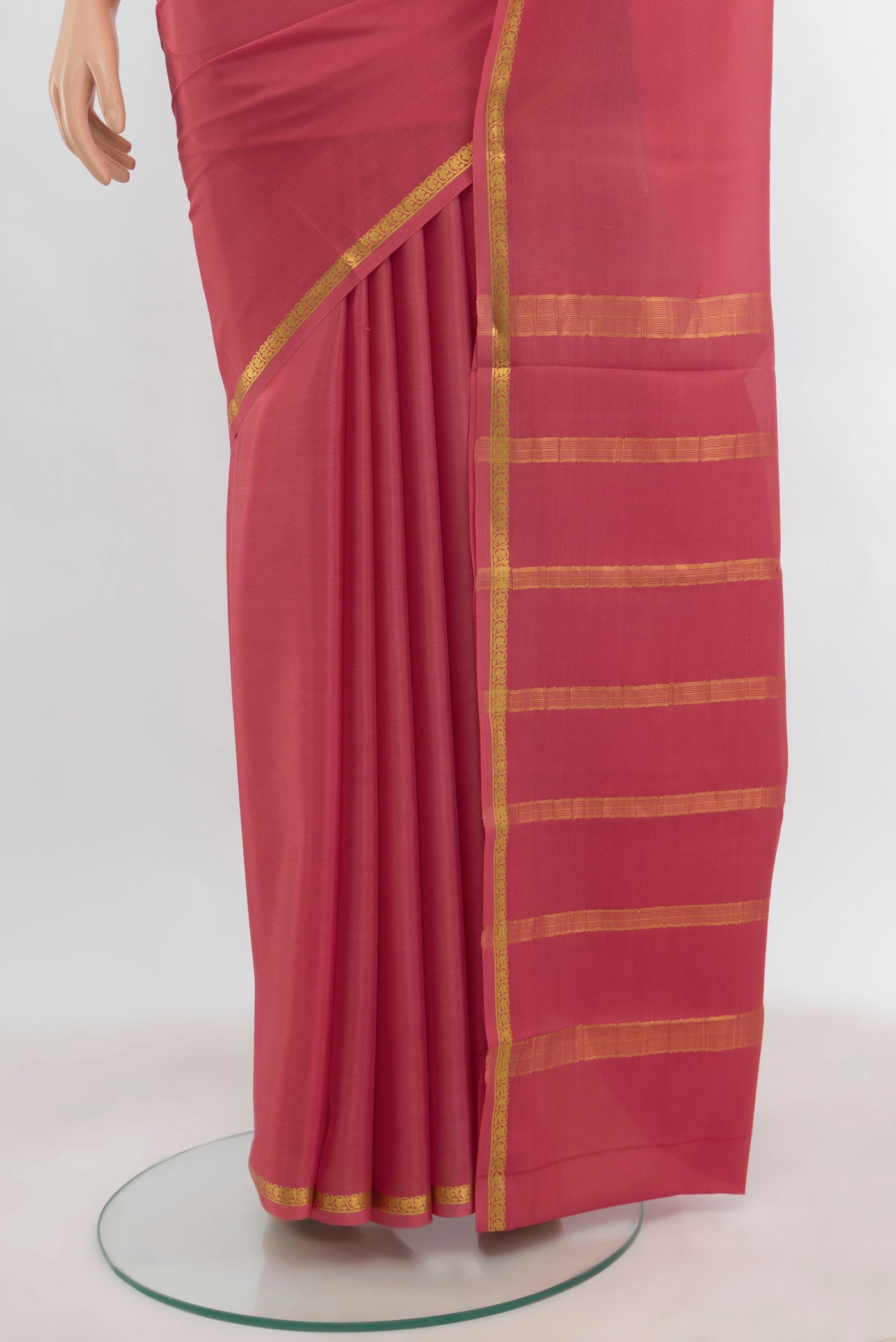 Pleats and pallu of Imperial Pink Mysore Crepe Saree with Zari Butta on the body and Zari Border. 