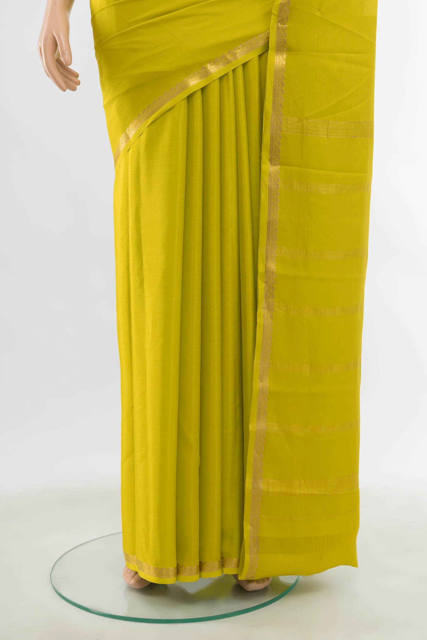 Pleats and pallu of Parrot Green Mysore Crepe Saree with Zari Butta on the body and Silk Border