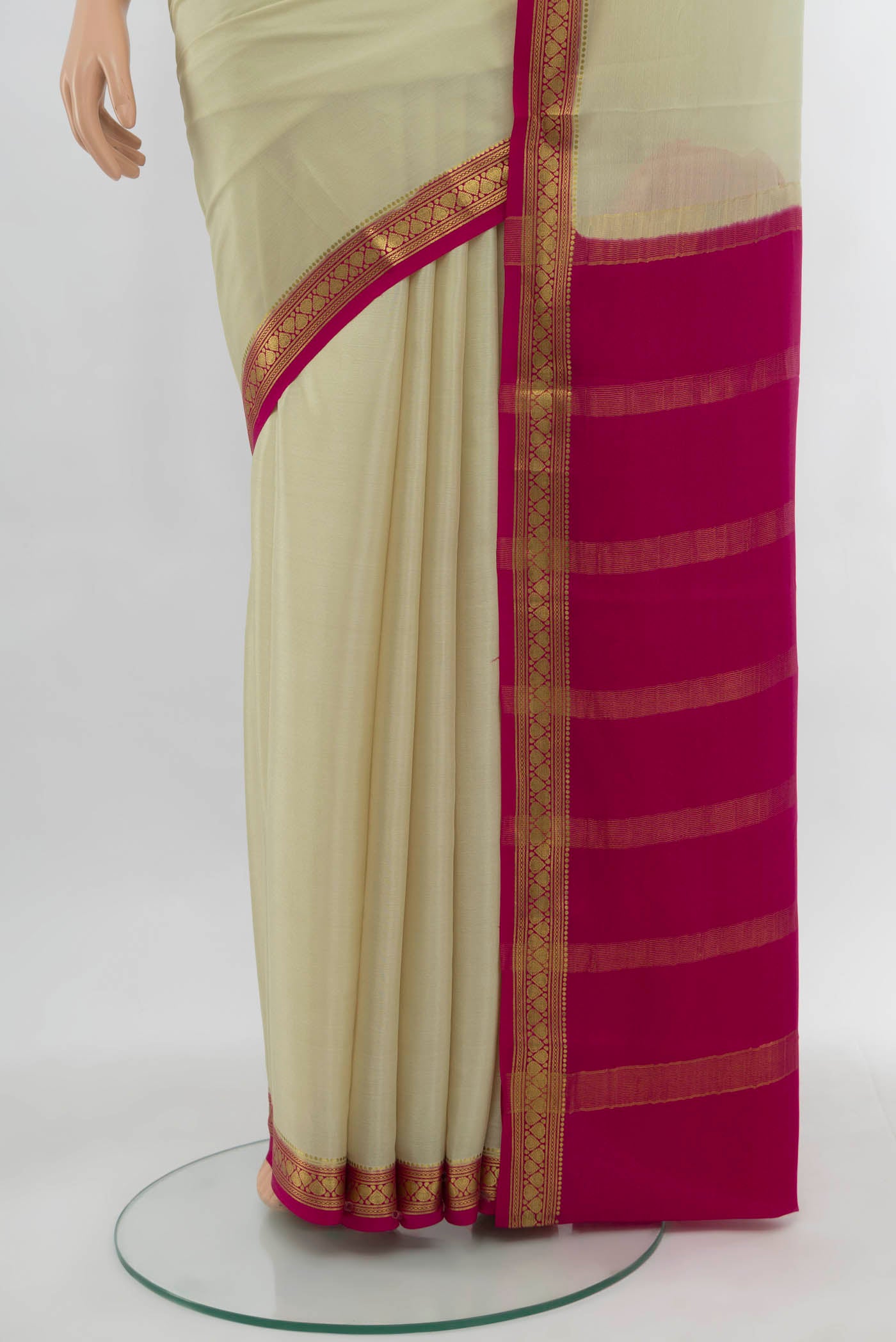 Pleats and pallu of Cream Mysore Crepe Saree with Plain Body and Silk Border. 
