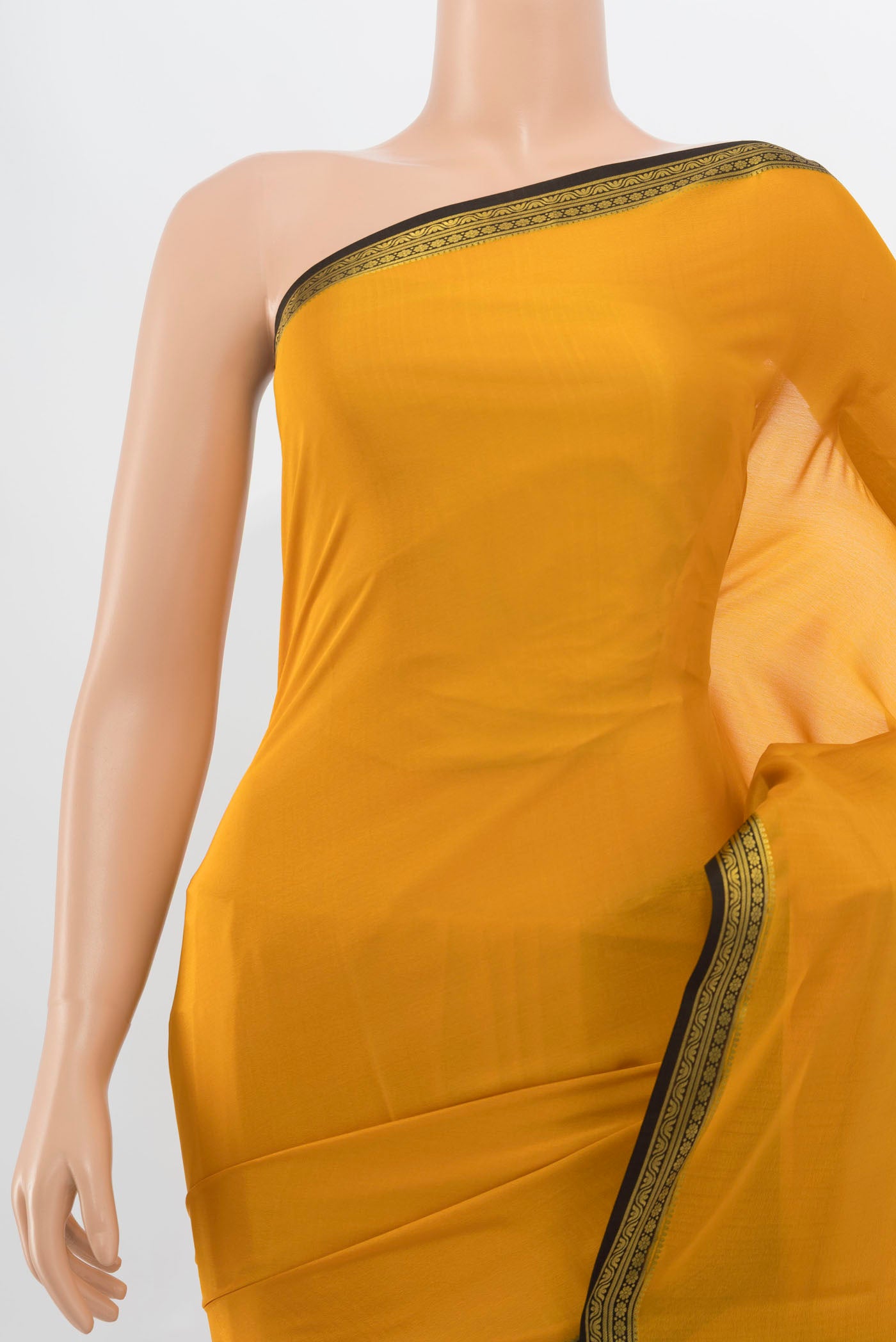 Border image of Mustard Mysore Crepe Saree with Plain Body and Silk Border. 