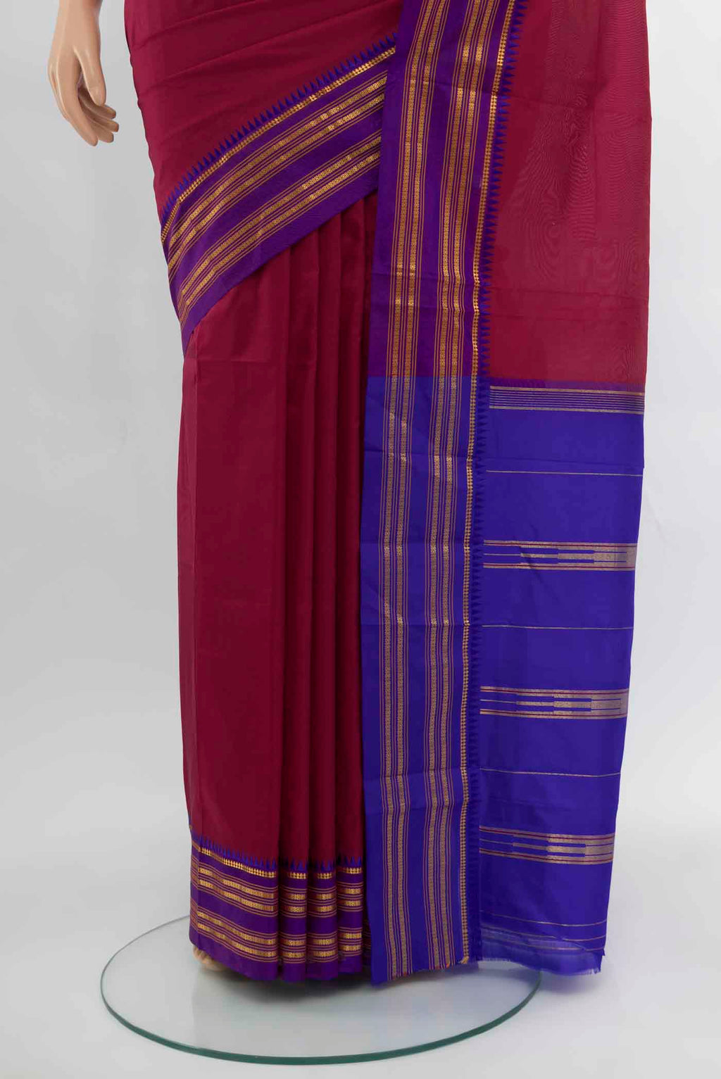 Pleats and pallu of Maroon Narayanpet Silk Saree with Zari Butta on the body and Silk Border. 