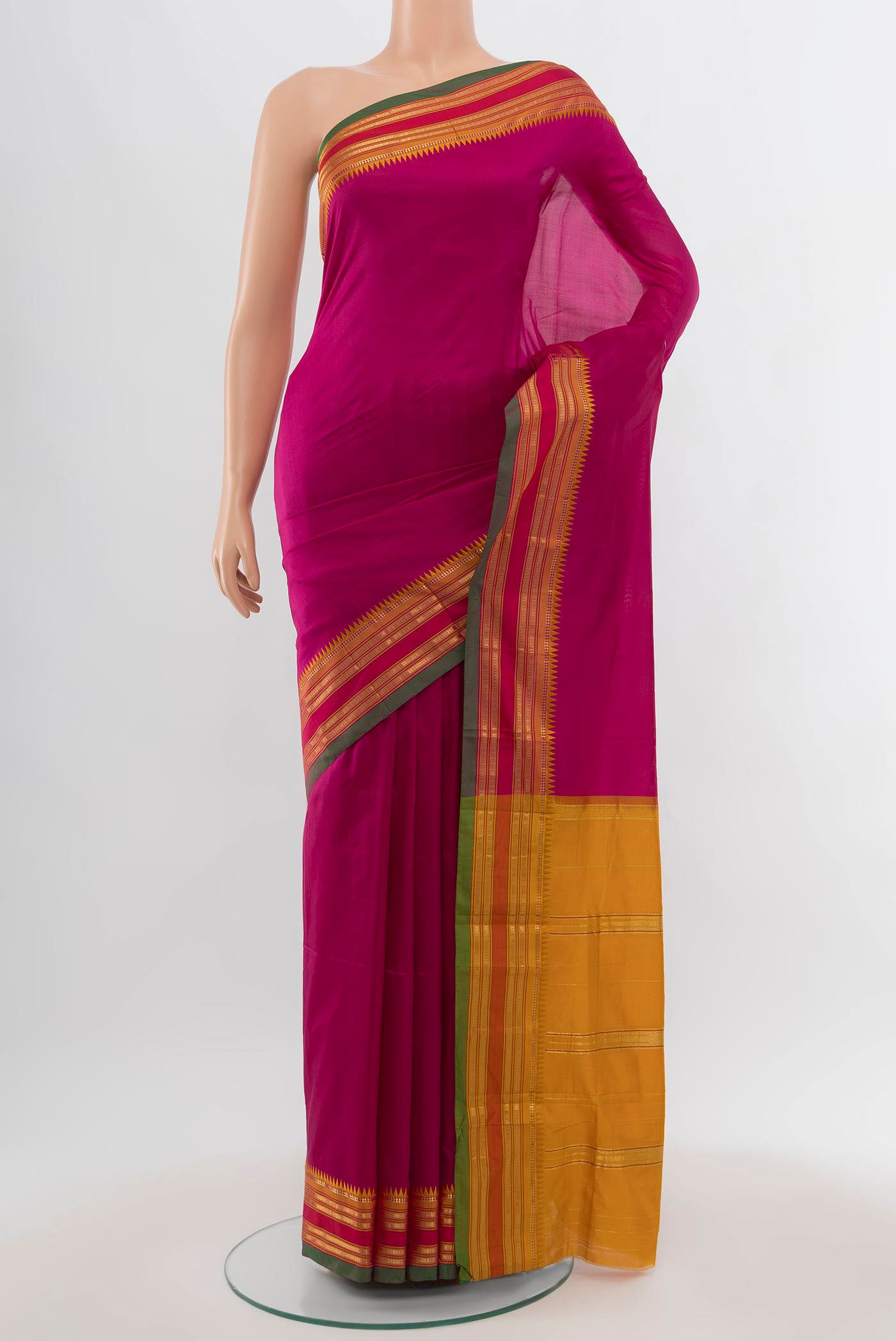 Dark Pink Narayanpet Silk Saree with Zari Butta on the body and Zari Border.  displayed on a mannequin