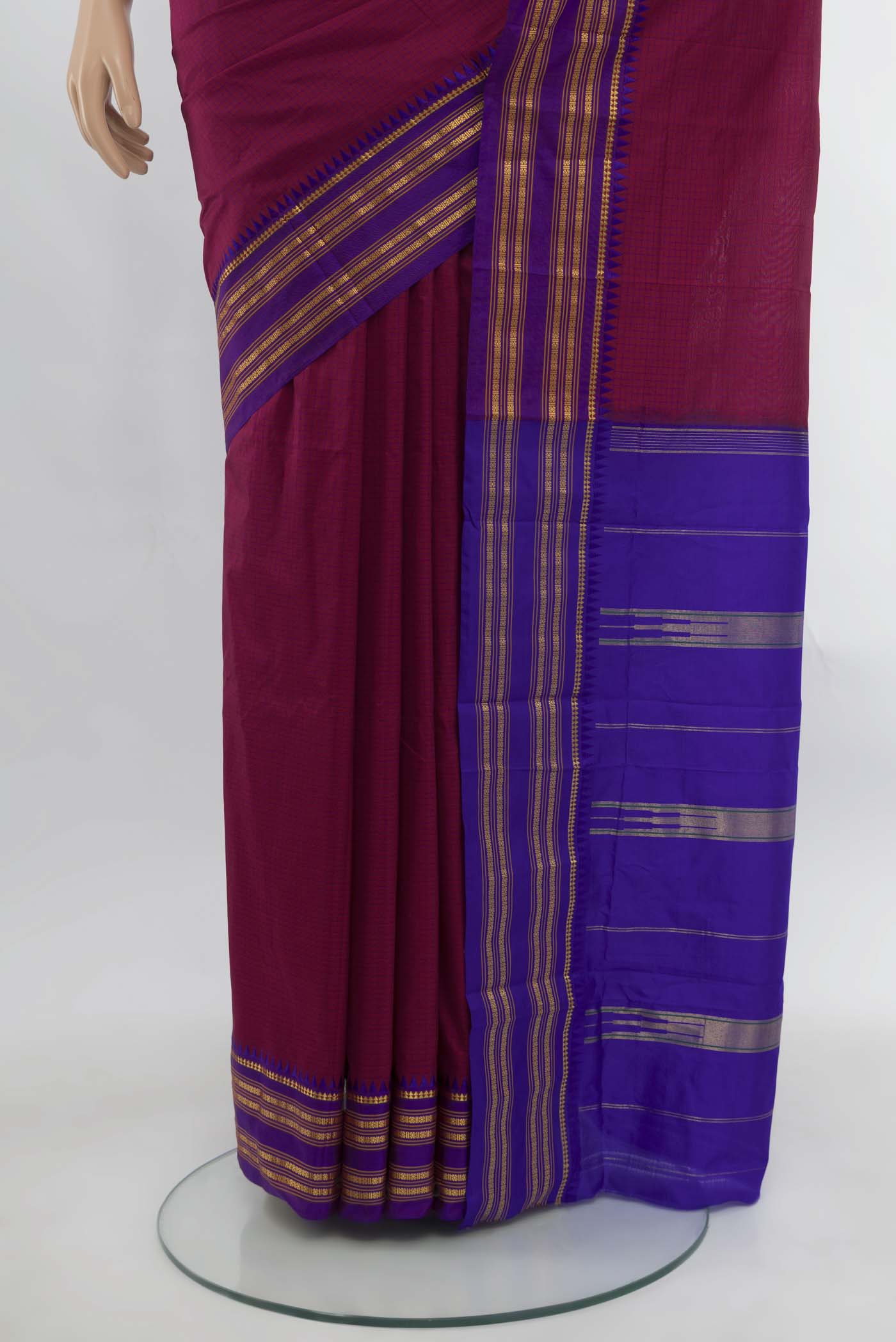Pleats and pallu of Maroon Narayanpet Silk Saree with Zari Butta on the body and Silk Border. 